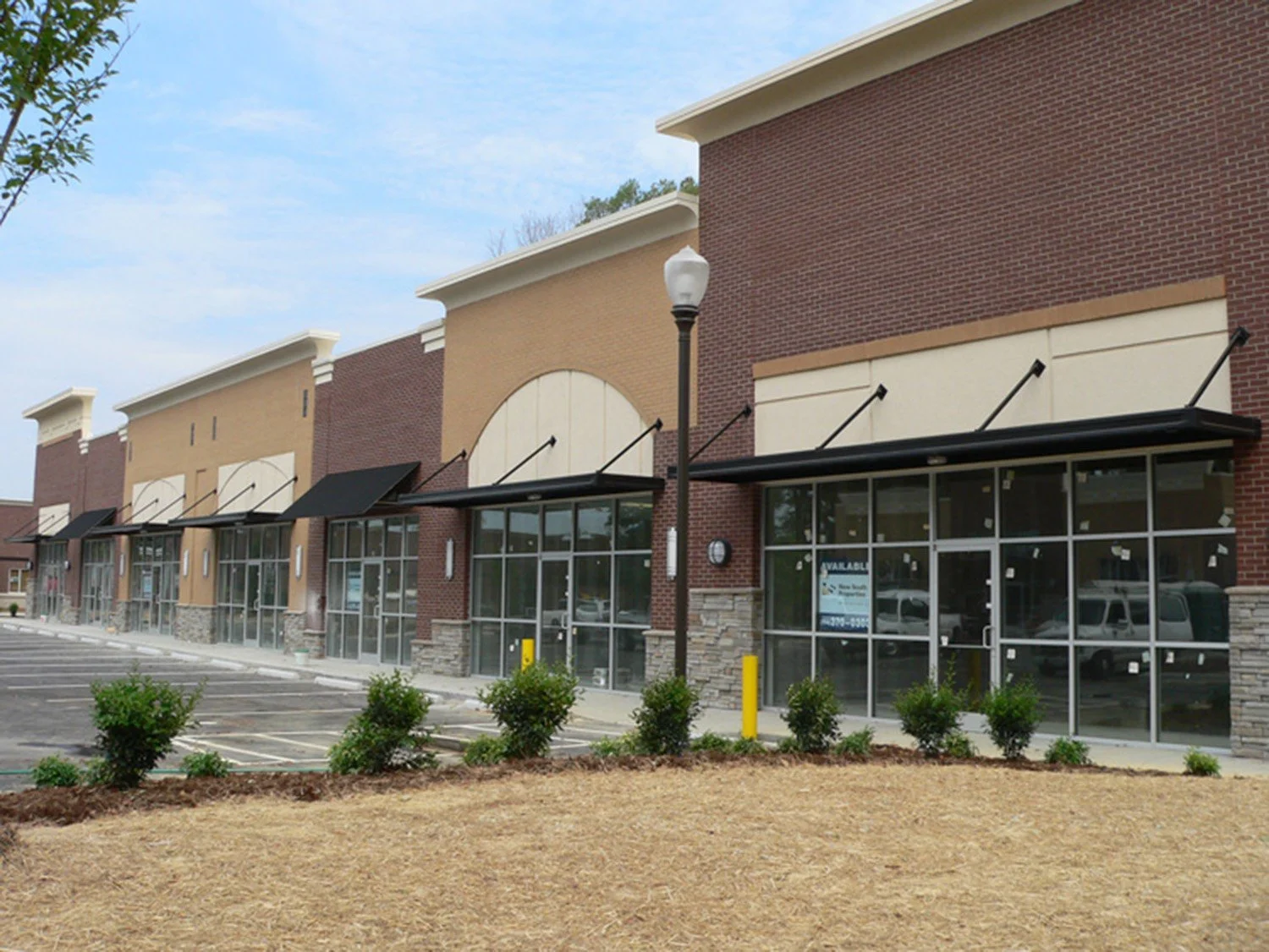 Durable storefront awning installed to protect customers and improve visibility.