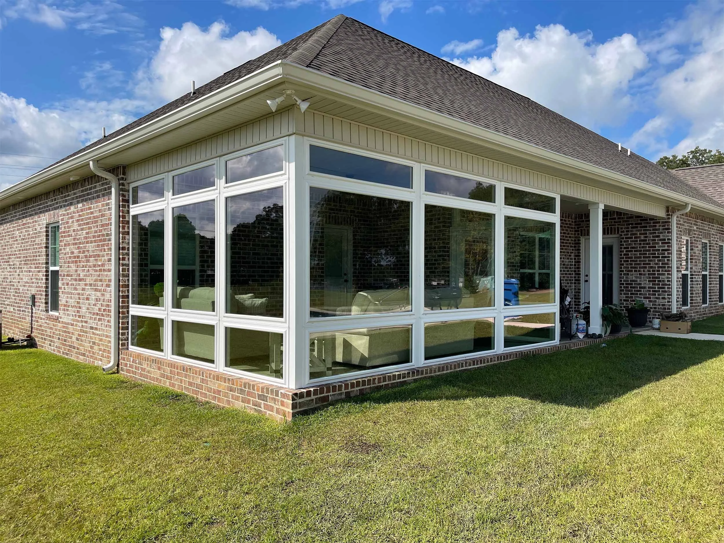 Custom sunroom addition designed to bring natural light into a Dothan-area home.