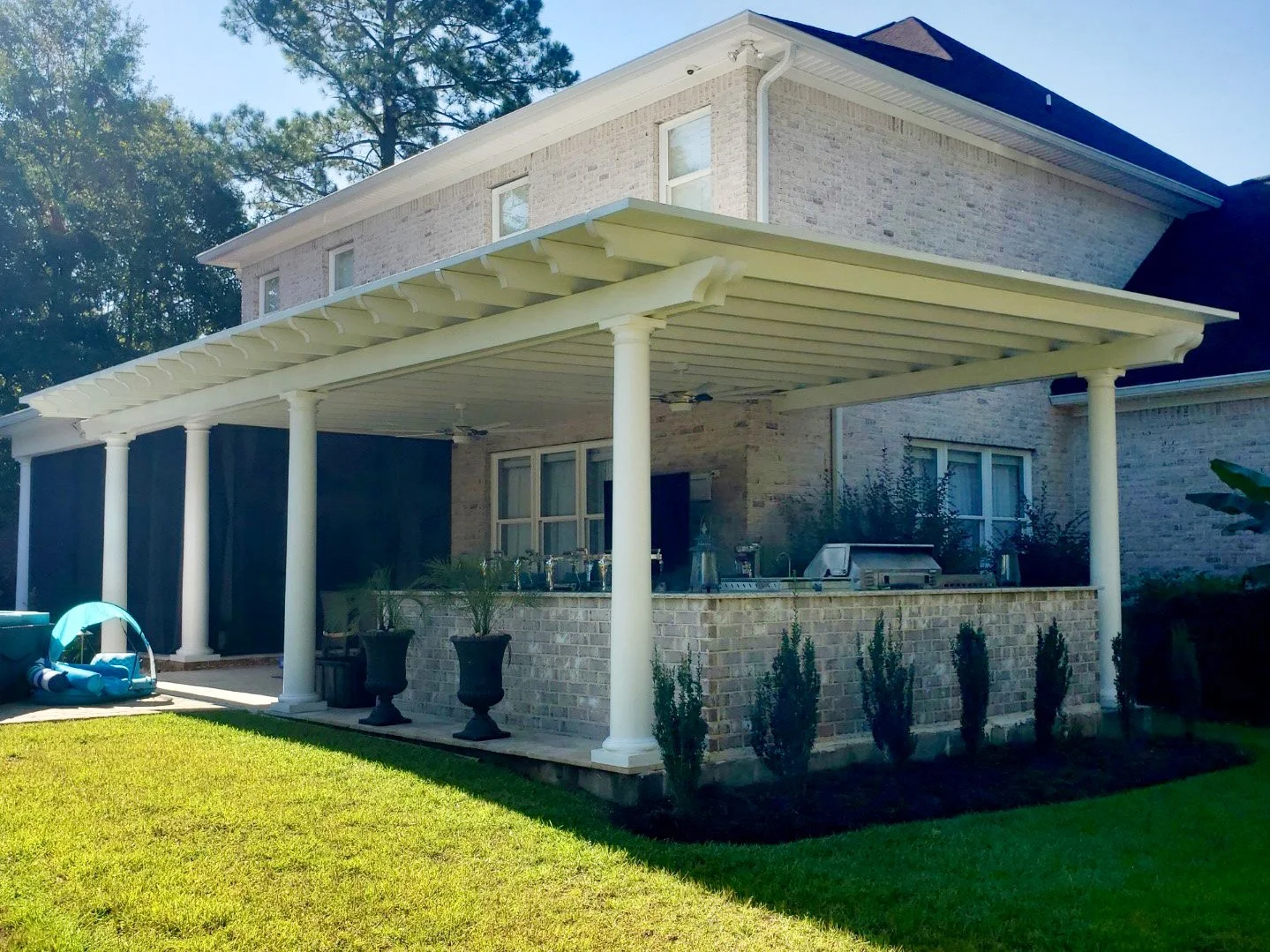 Custom patio cover built to blend with the home’s existing architecture.