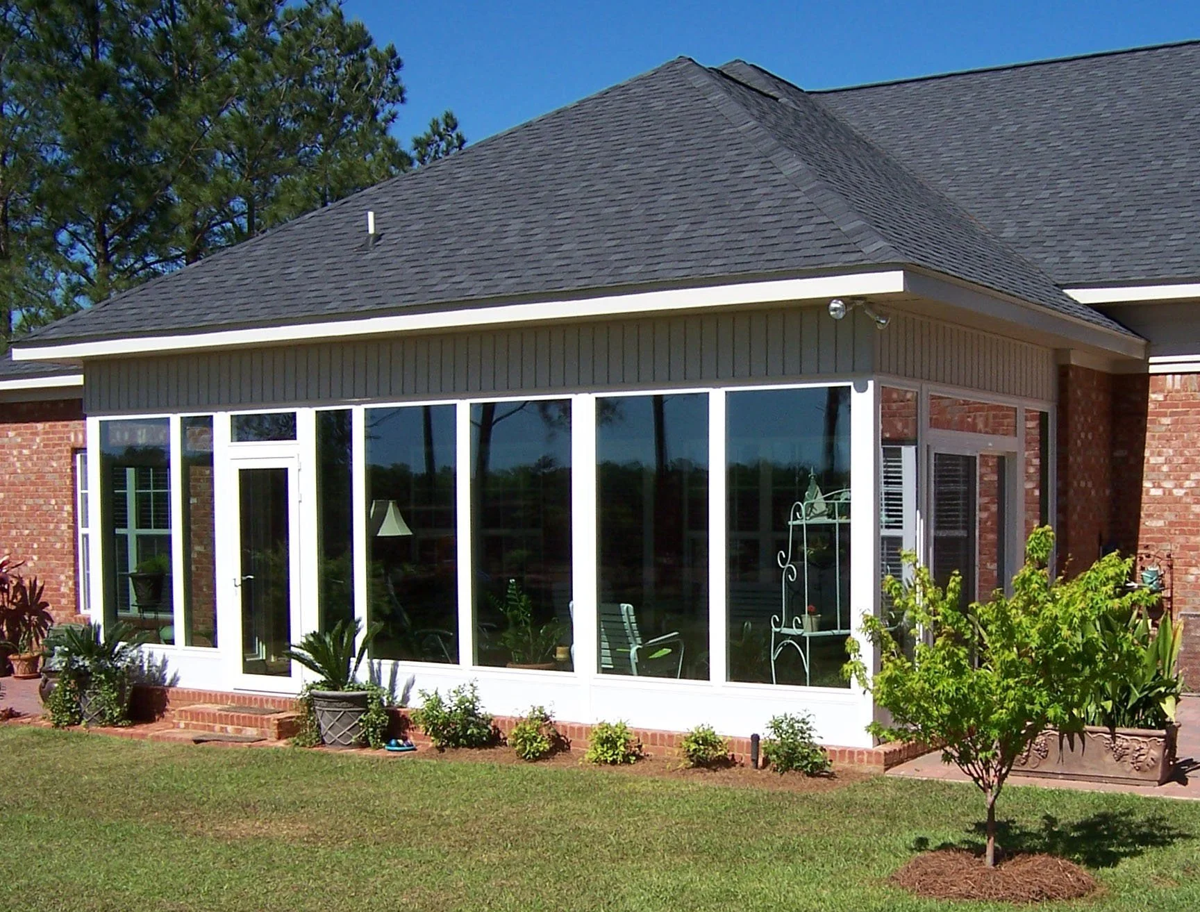 Sunroom installation featuring a bright, open design for added home comfort.