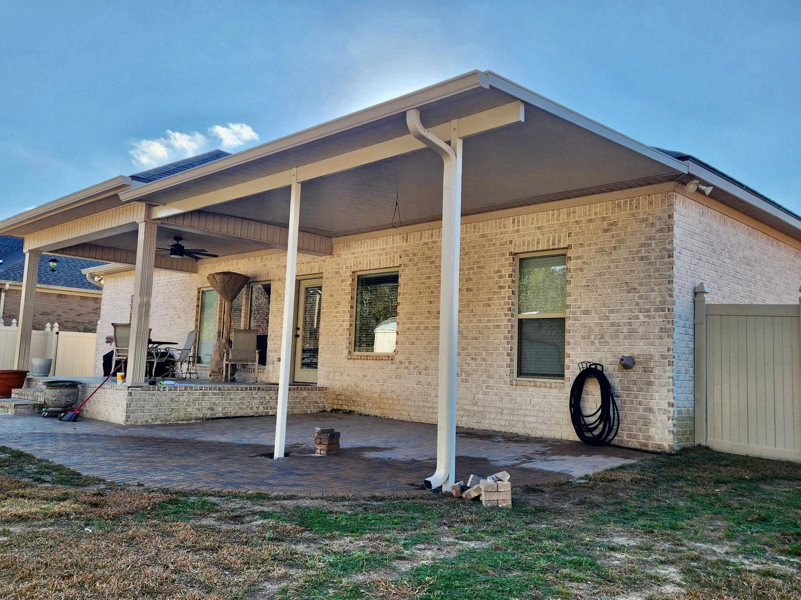 Patio cover installation designed for comfortable outdoor entertaining.
