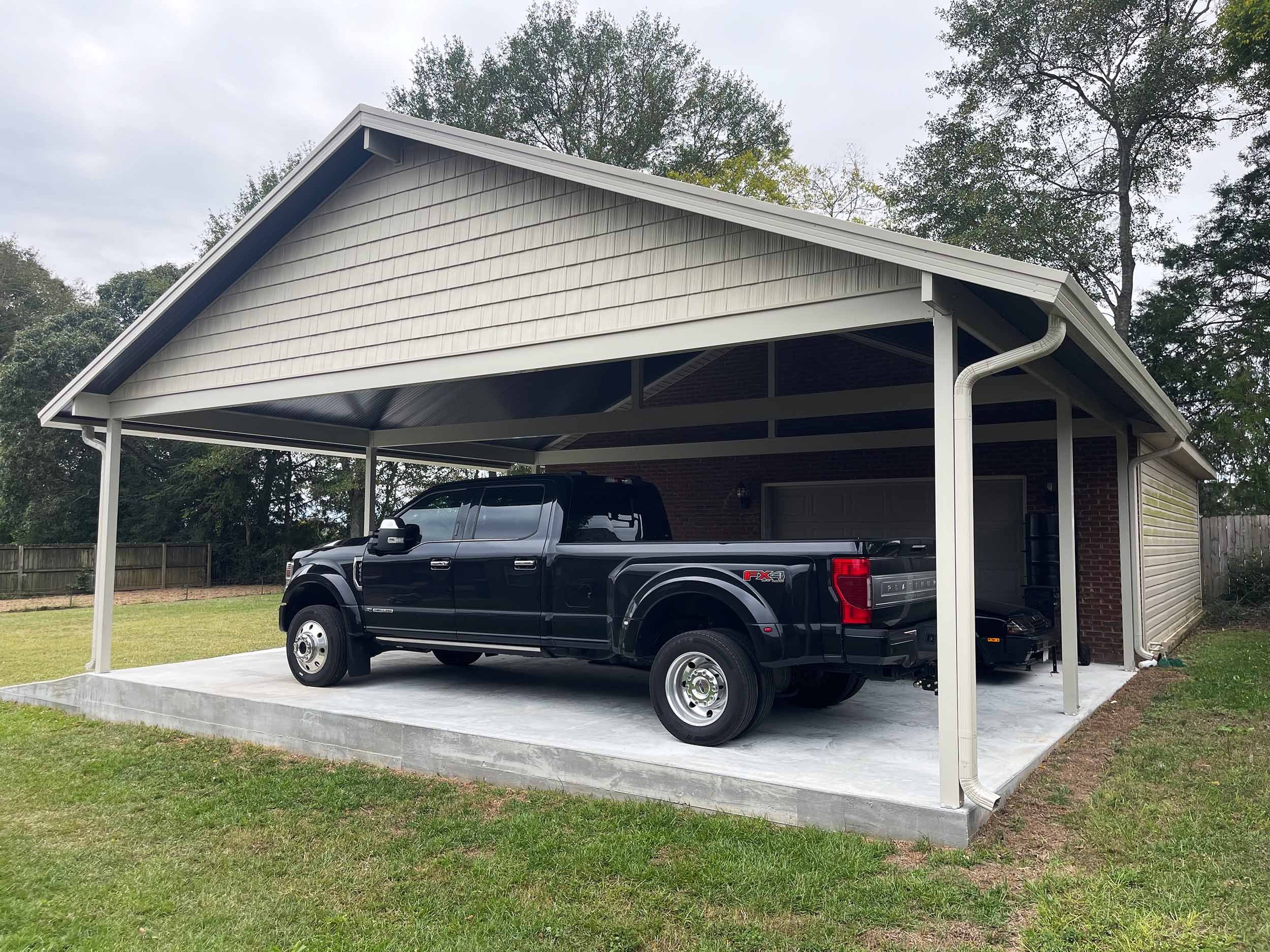 Carport installation designed to improve function and curb appeal.