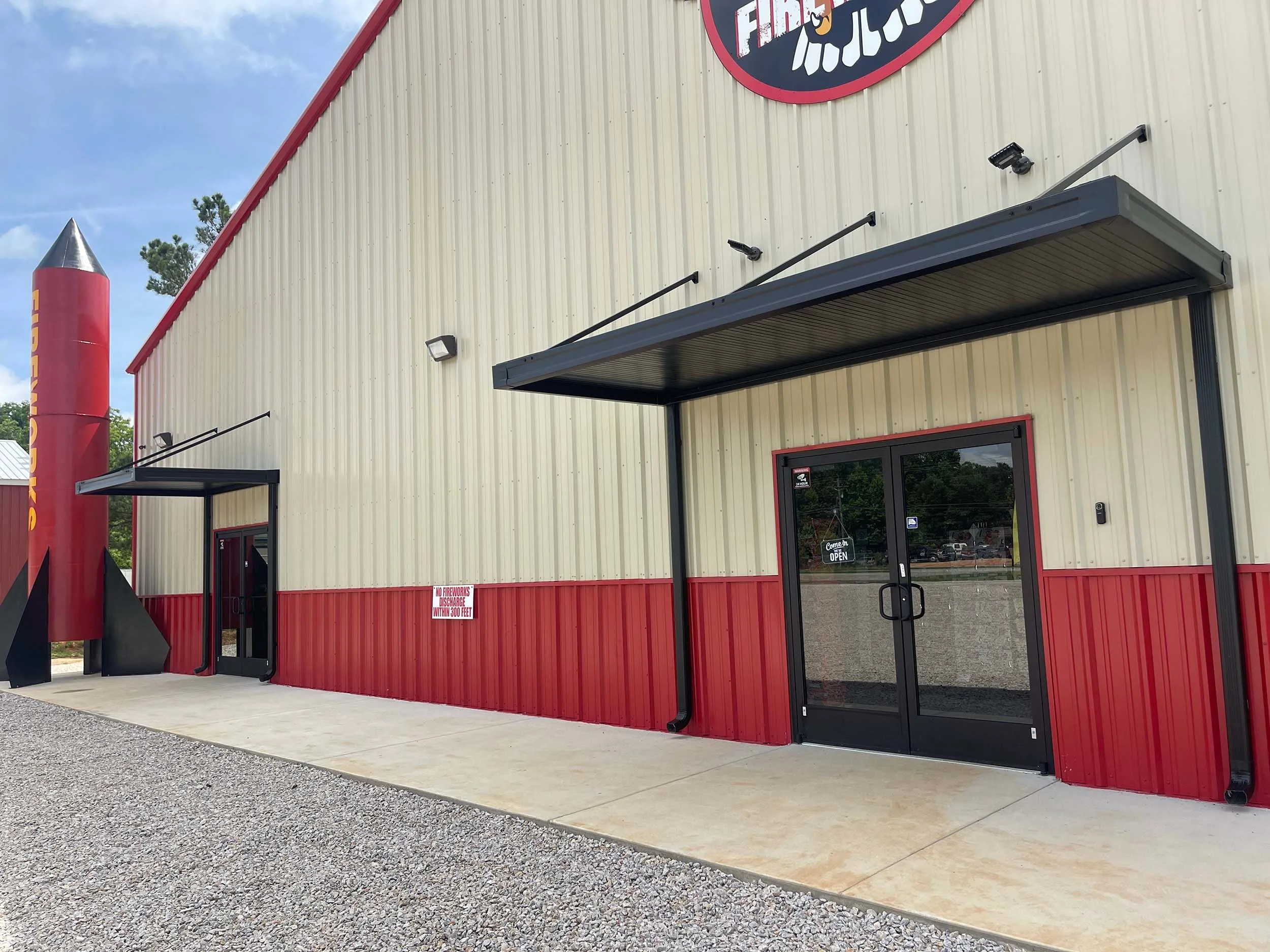 Commercial storefront awning designed to complement the building’s exterior style.