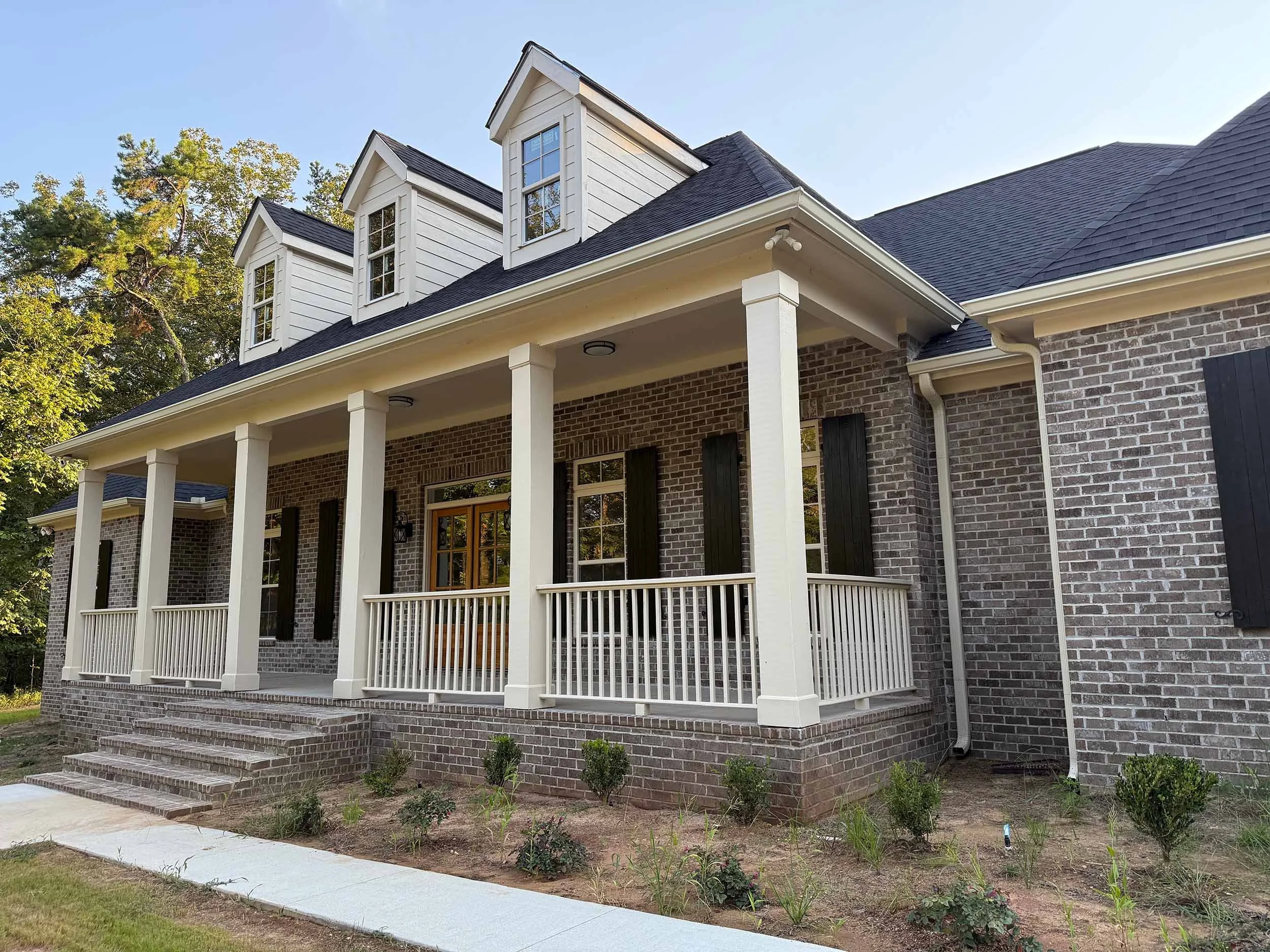 Seamless gutters installed to blend cleanly with the home’s exterior trim.