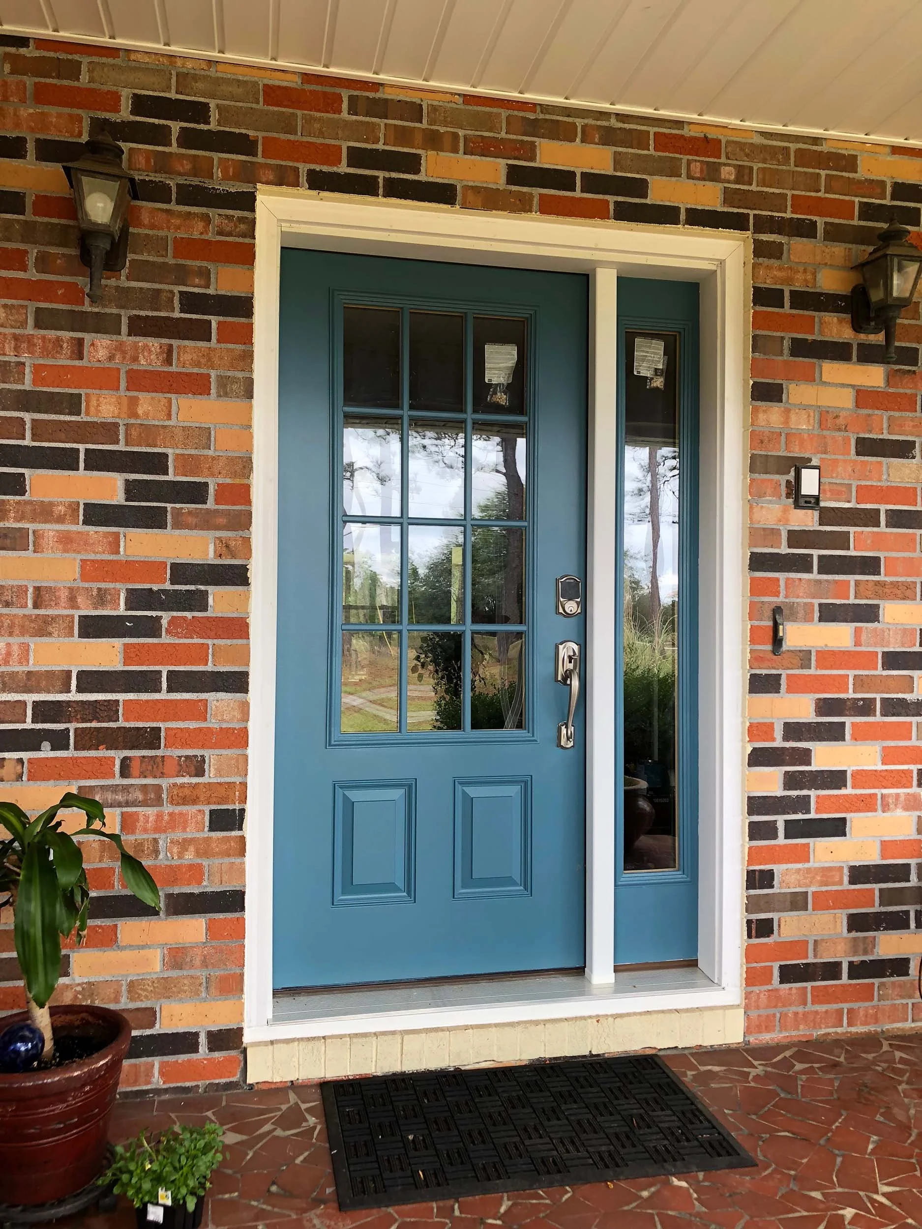 Custom replacement door designed to improve curb appeal, comfort, and security.