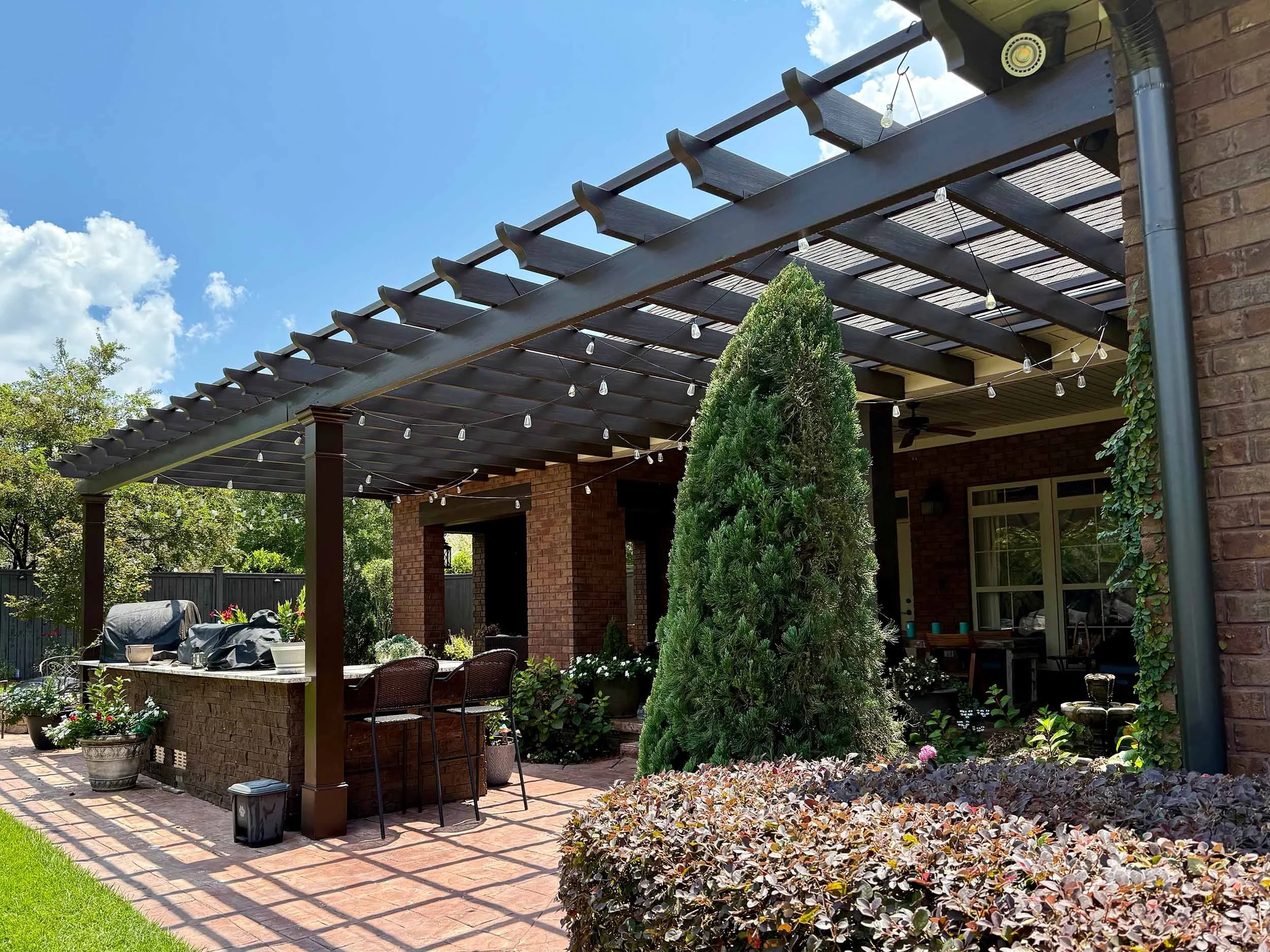 Custom pergola installation for a residential home in the Dothan area.