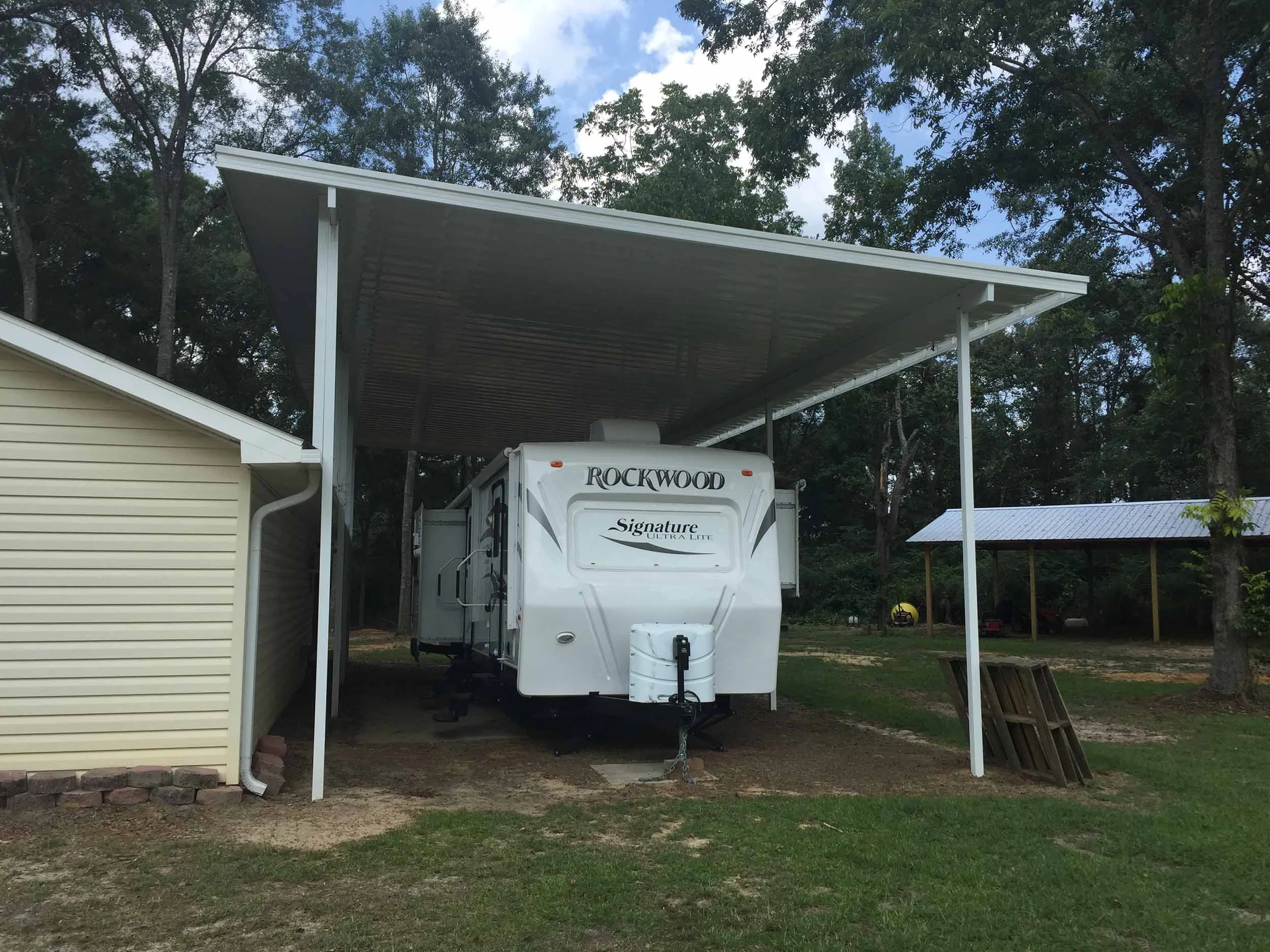 Residential carport project designed for a camper trailer.