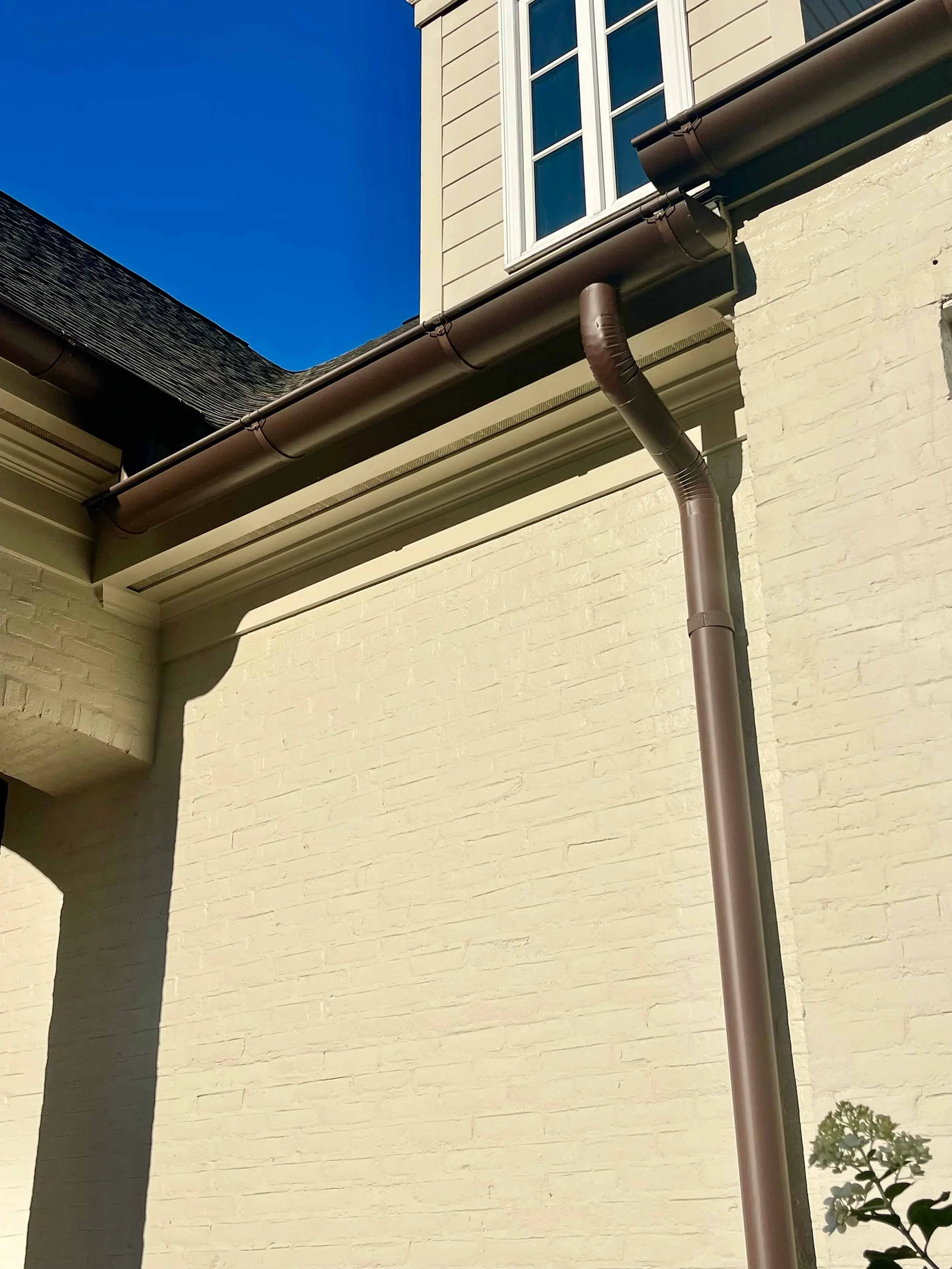Residential gutter replacement project with clean, custom-fit seamless gutters.