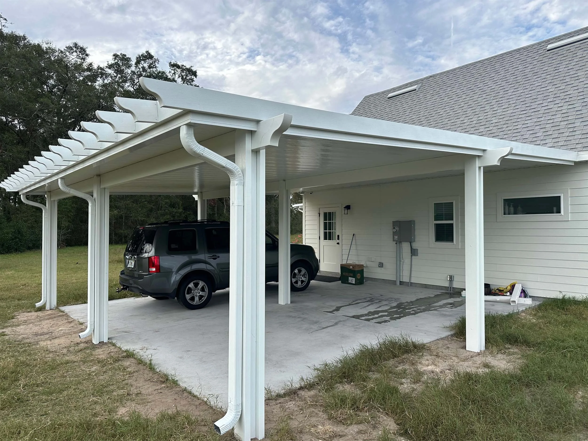 Durable residential carport built for shade and everyday vehicle protection.