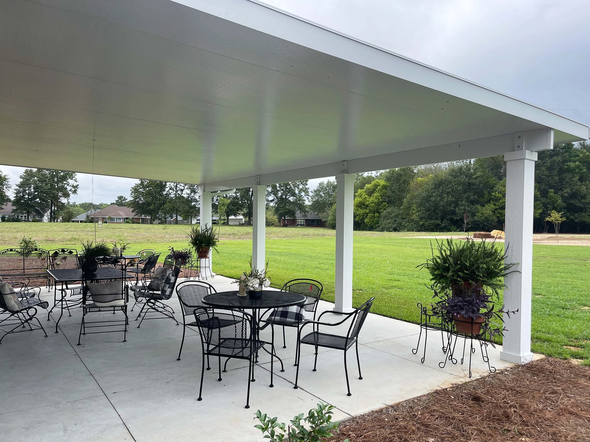 Residential patio cover installation for year-round outdoor comfort.