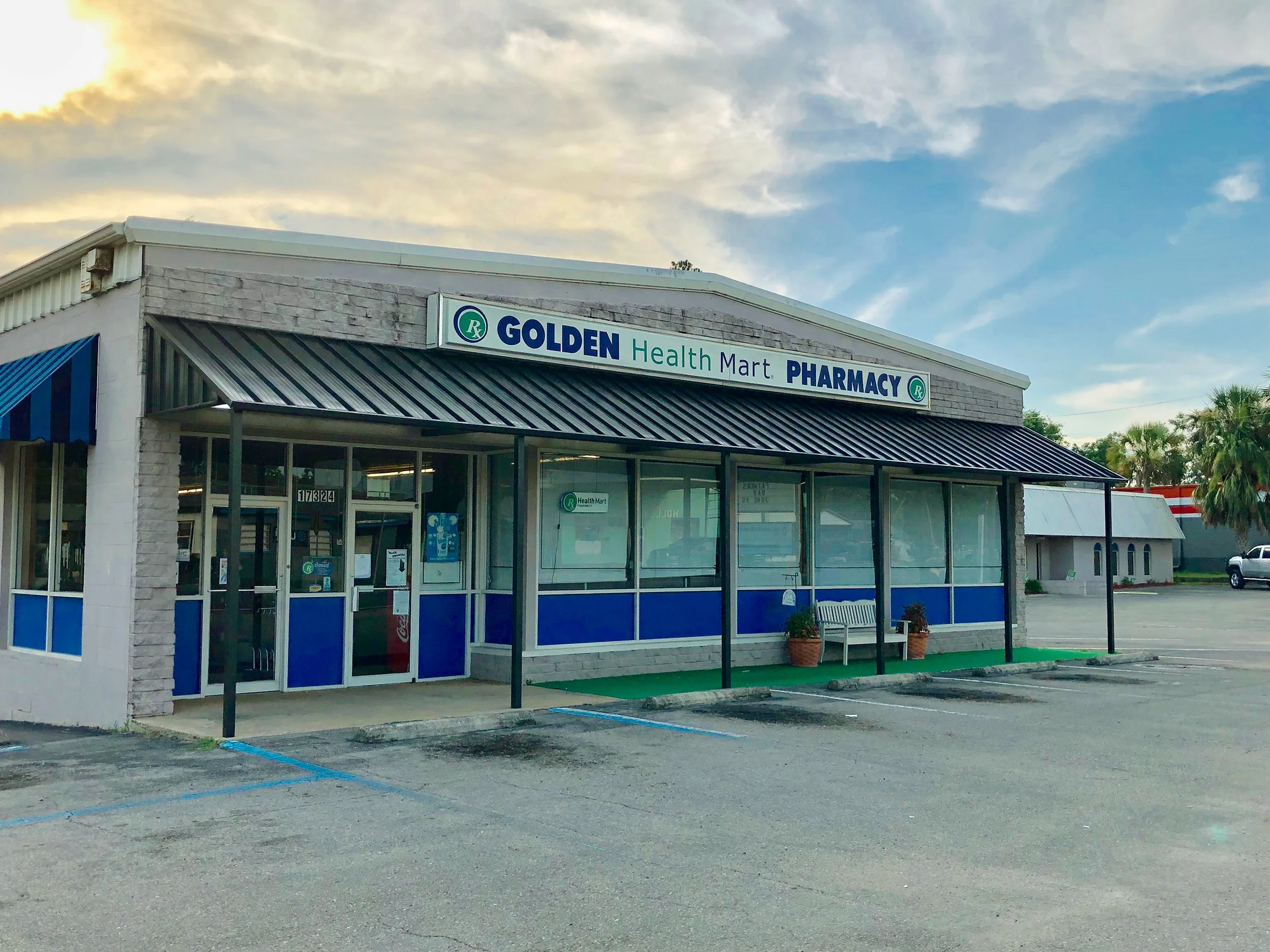 Commercial awning designed to add shade, visibility, and curb appeal to a storefront.