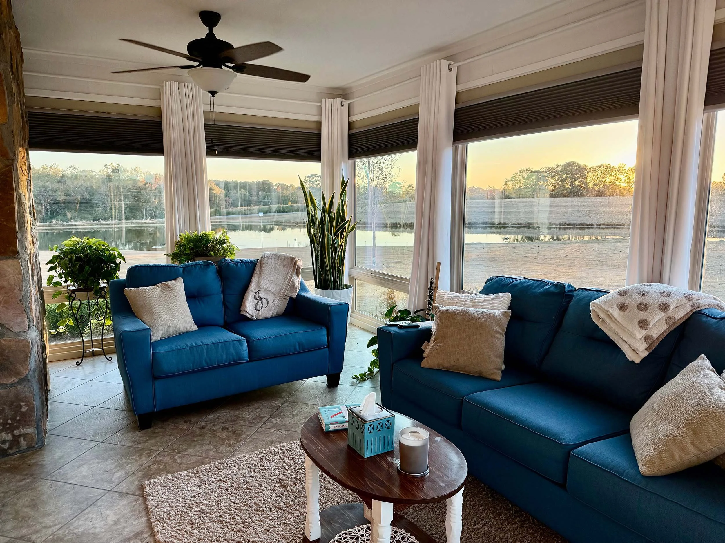 Custom enclosed sunroom designed to improve comfort and home functionality.