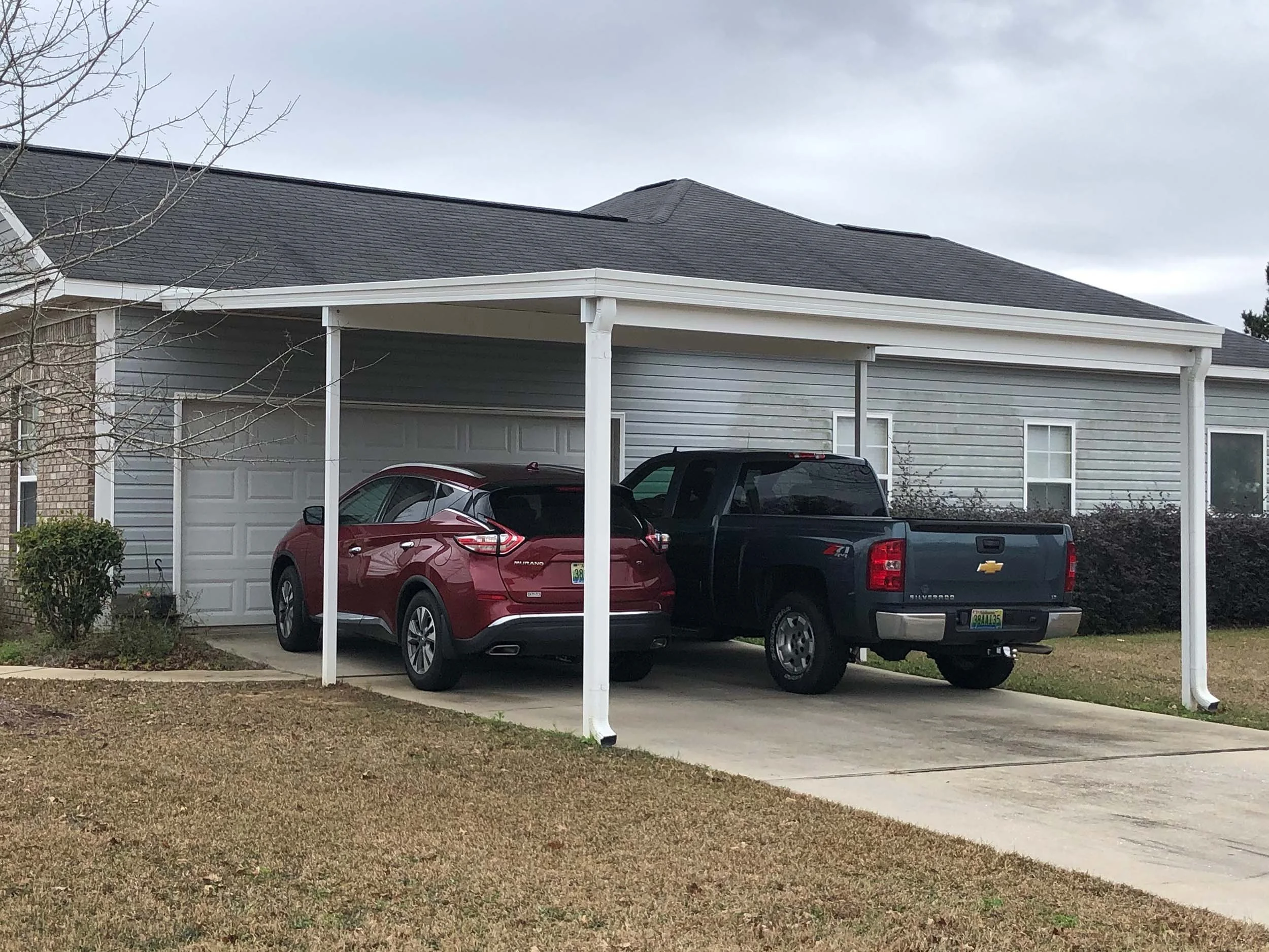 Custom carport addition designed to complement the home’s exterior.