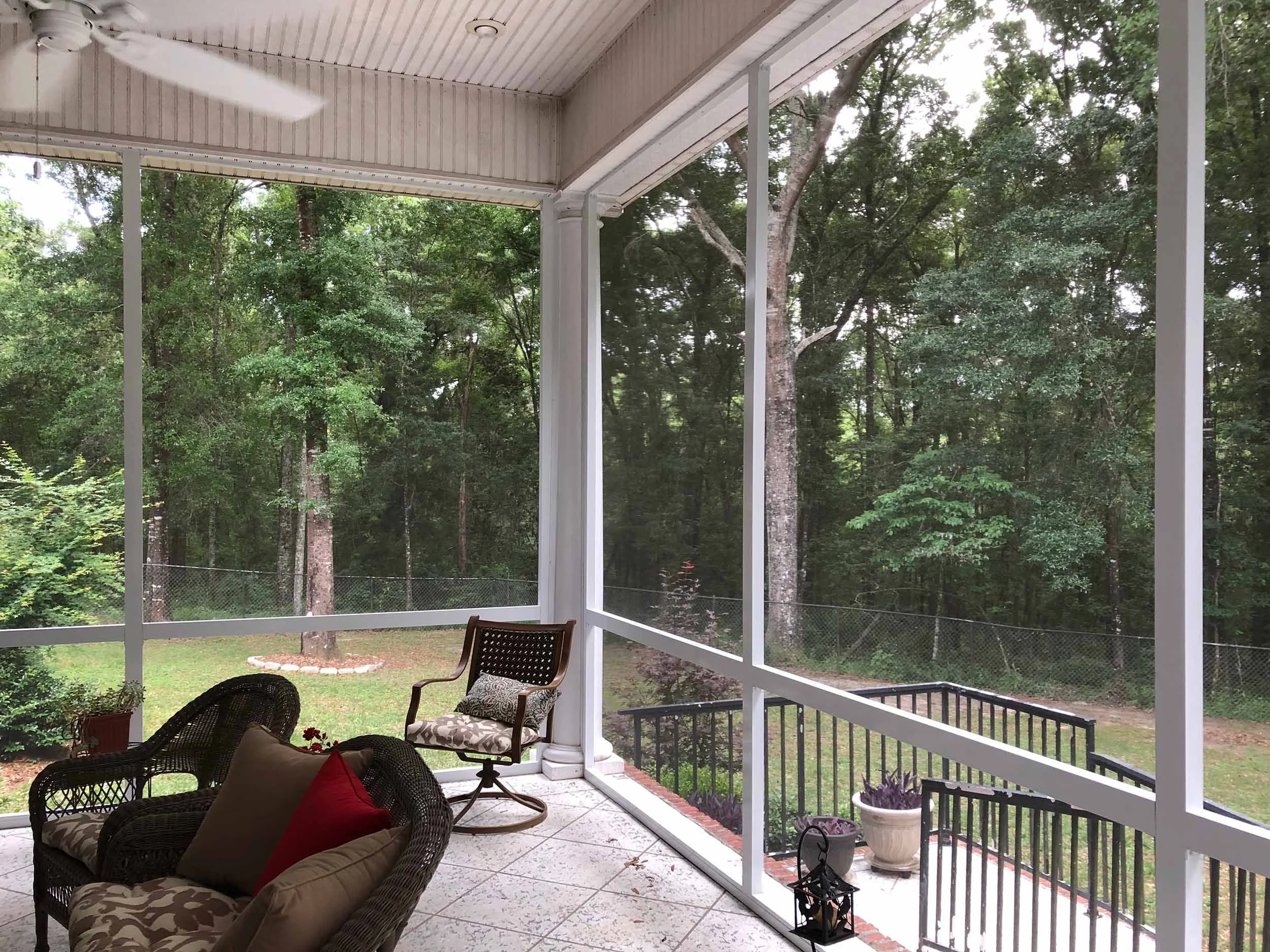 Custom screenroom designed to bring fresh air and shade to the home.