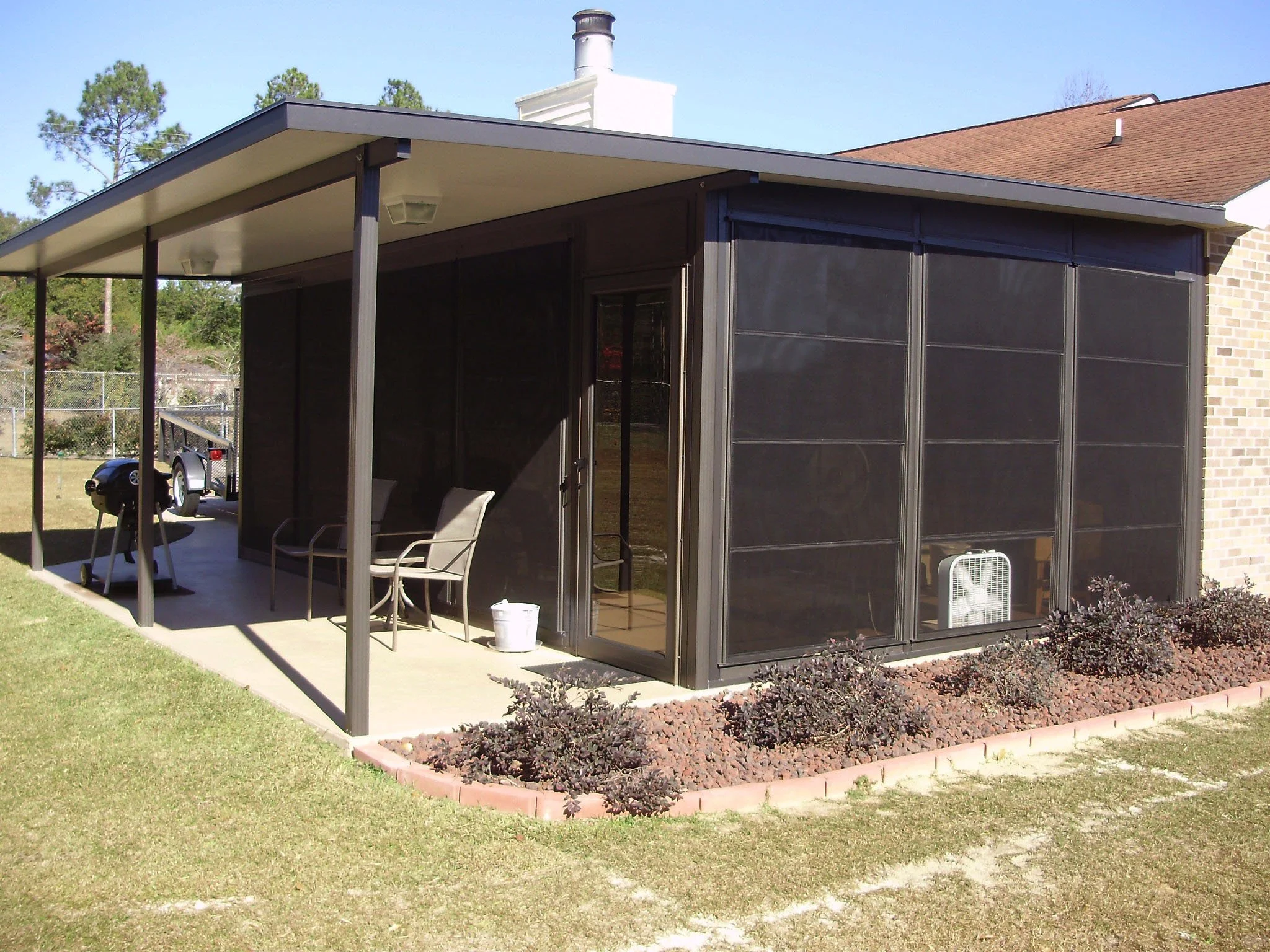 Residential EZE-Breeze enclosure creating a more usable patio or porch space.