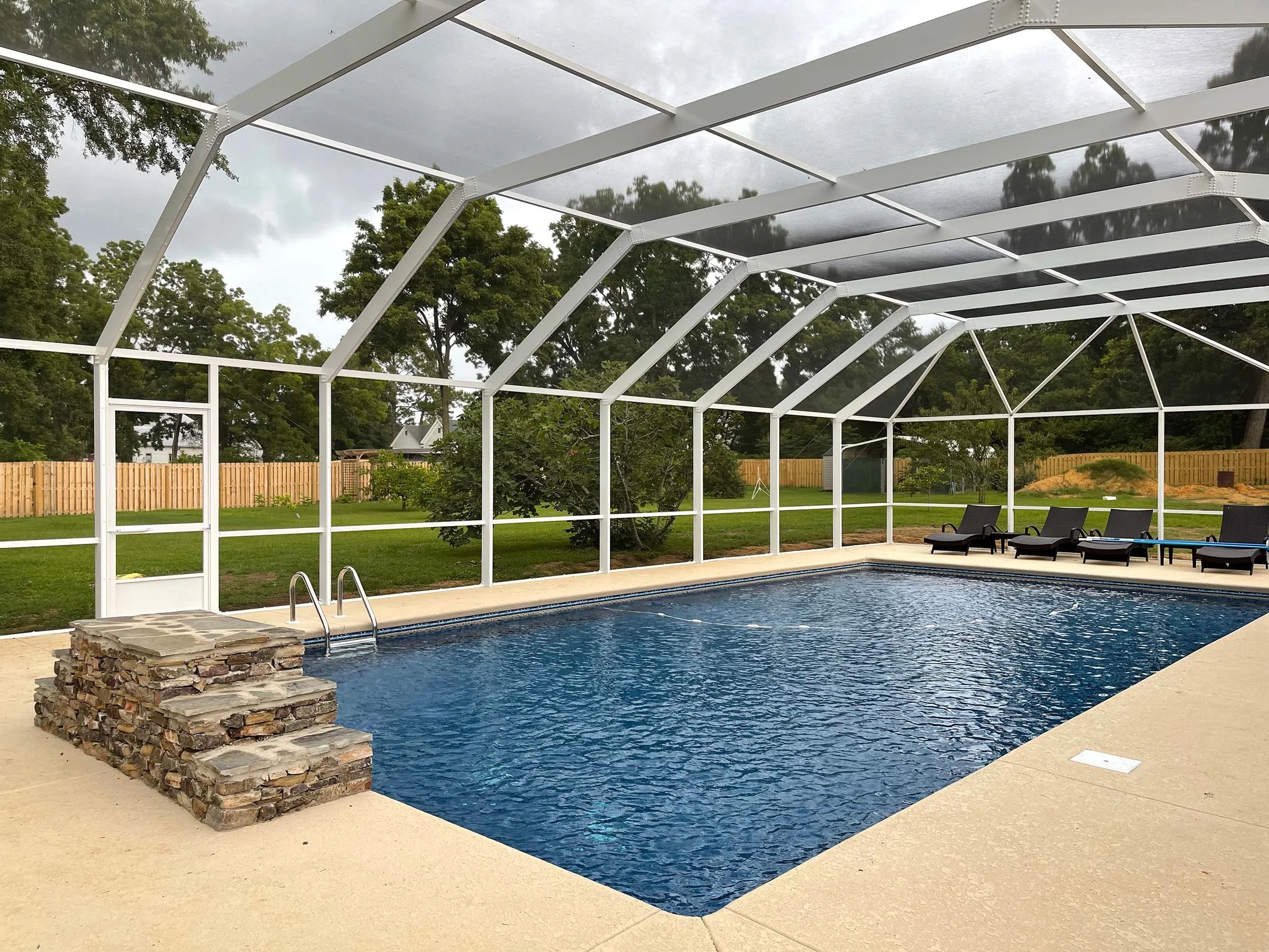 Custom pool cage built to create a more comfortable outdoor living space.