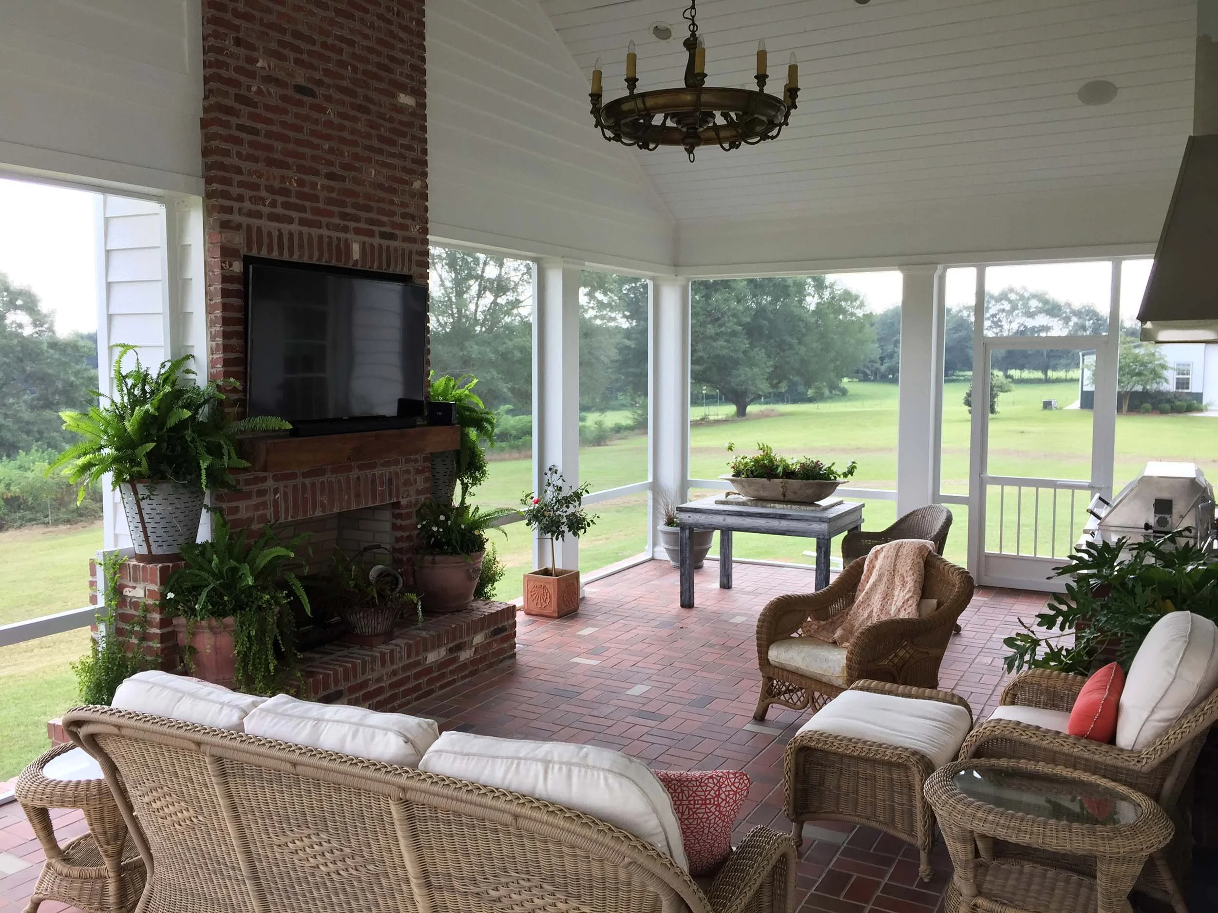 Screenroom addition with large screened openings for natural light and airflow.