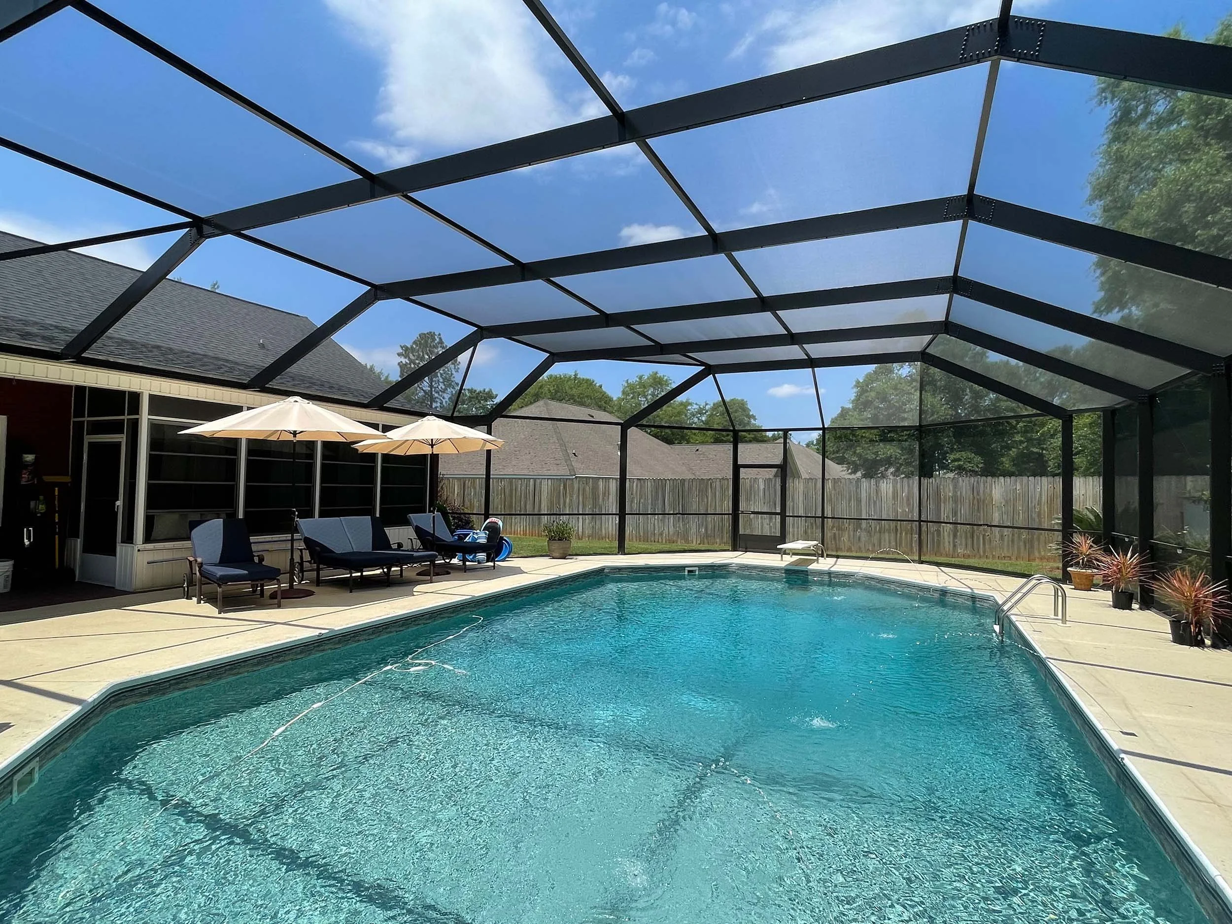 Custom pool cage enclosure designed for shade, airflow, and outdoor protection.