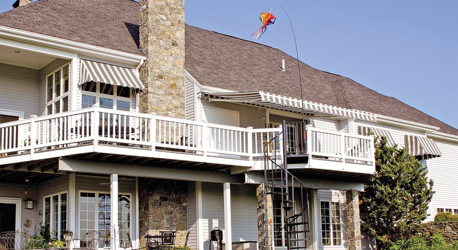 Custom window awnings designed to provide shade and improve home comfort.