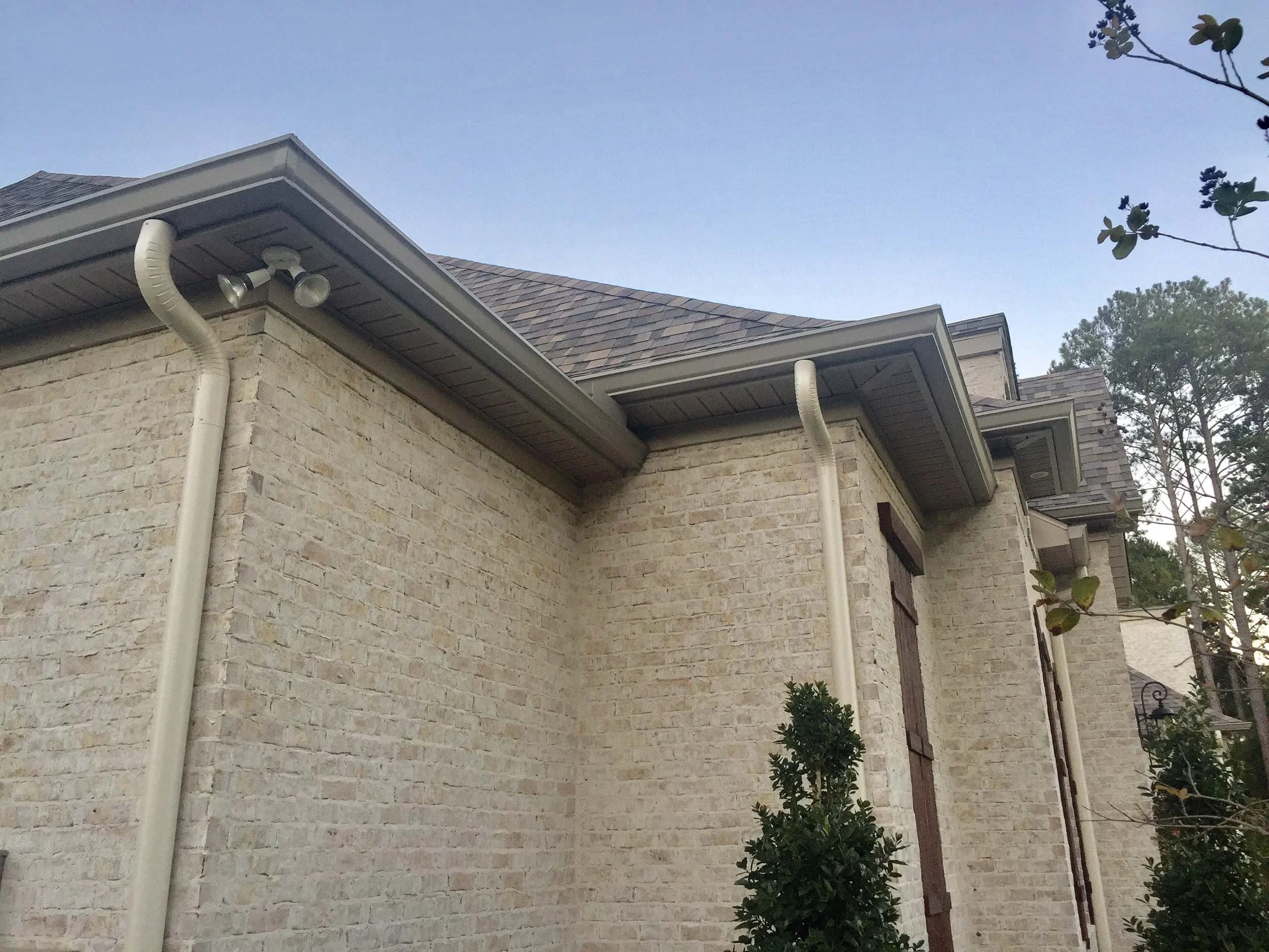 Residential gutter installation designed for proper rainwater drainage.