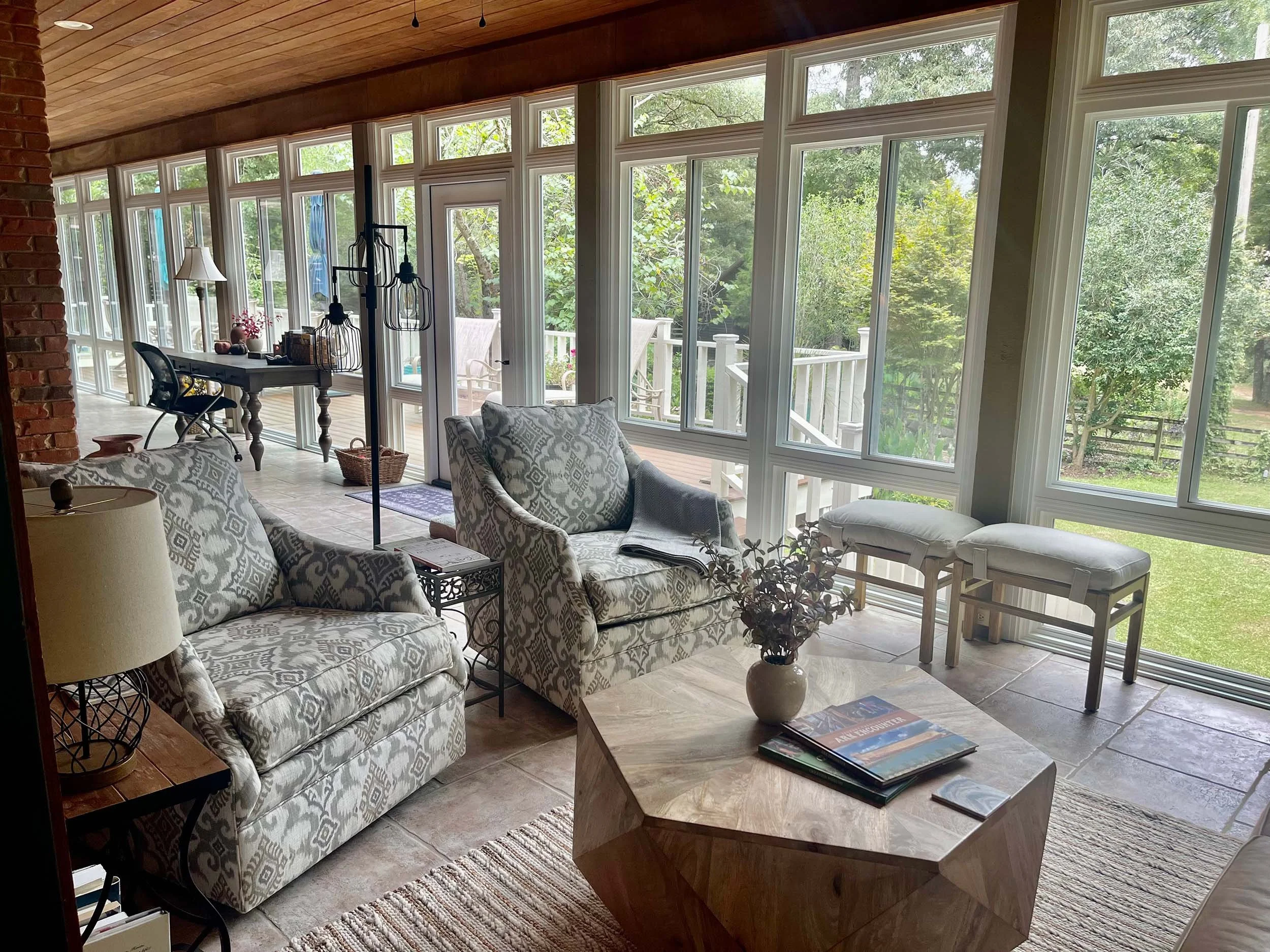 Enclosed sunroom designed to create a relaxing indoor-outdoor space.