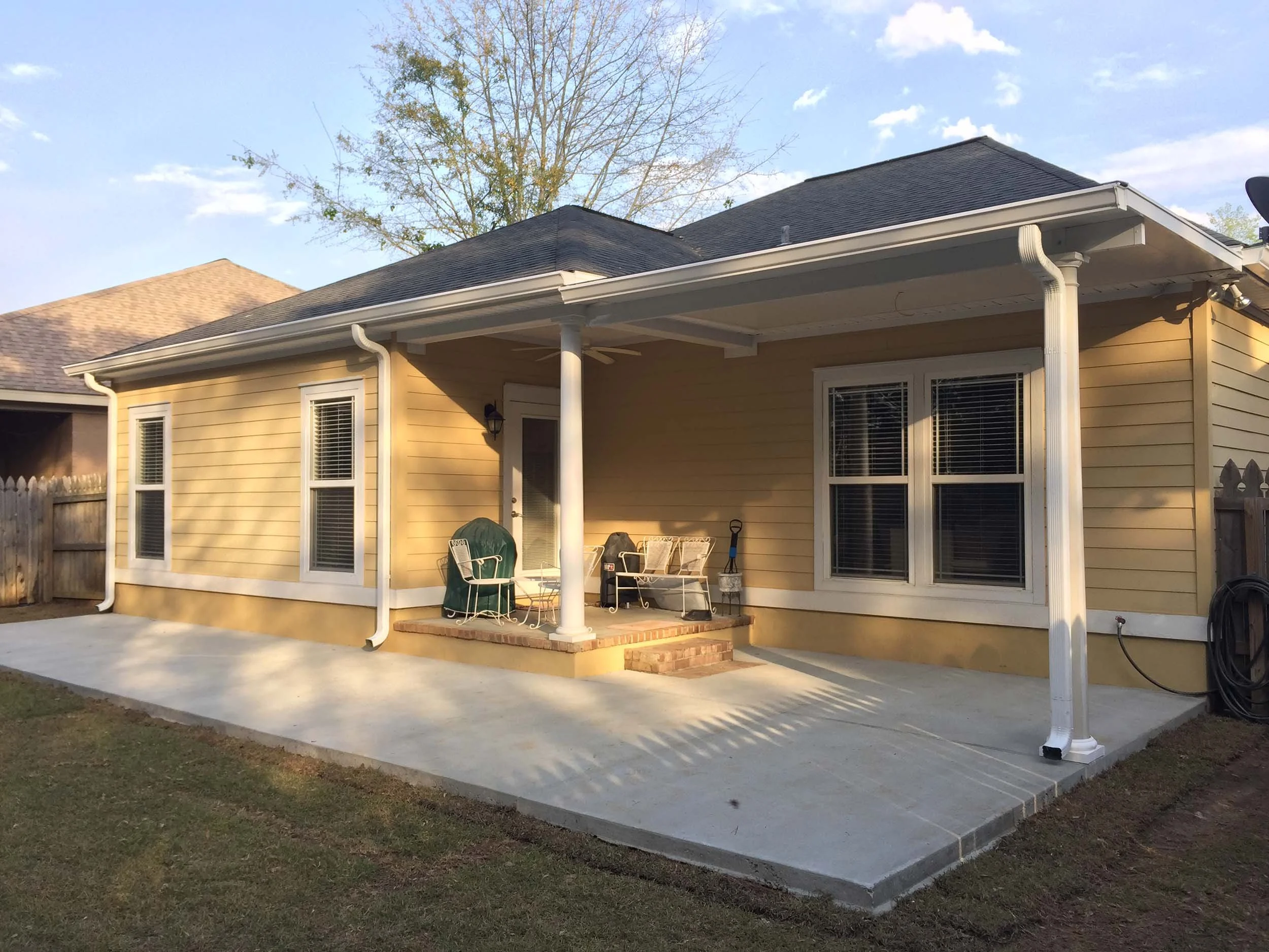 Custom awning and patio cover installation for a Dothan-area home.
