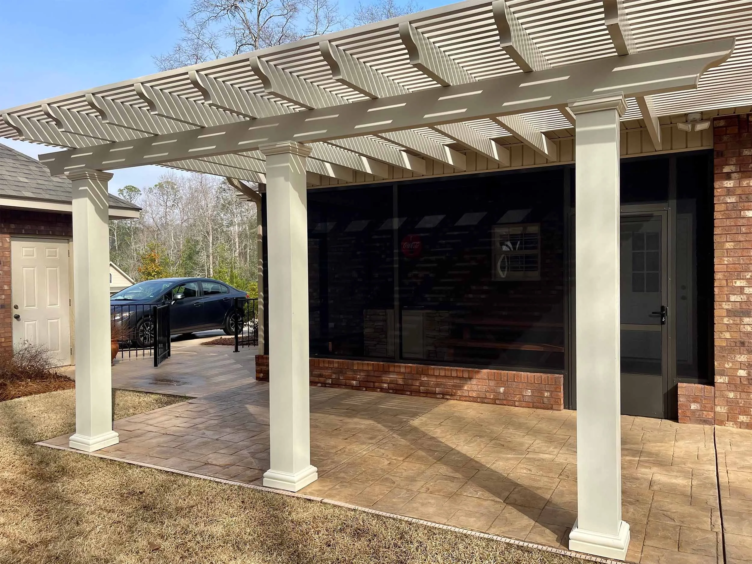 Pergola installation designed to enhance a patio or backyard living area.