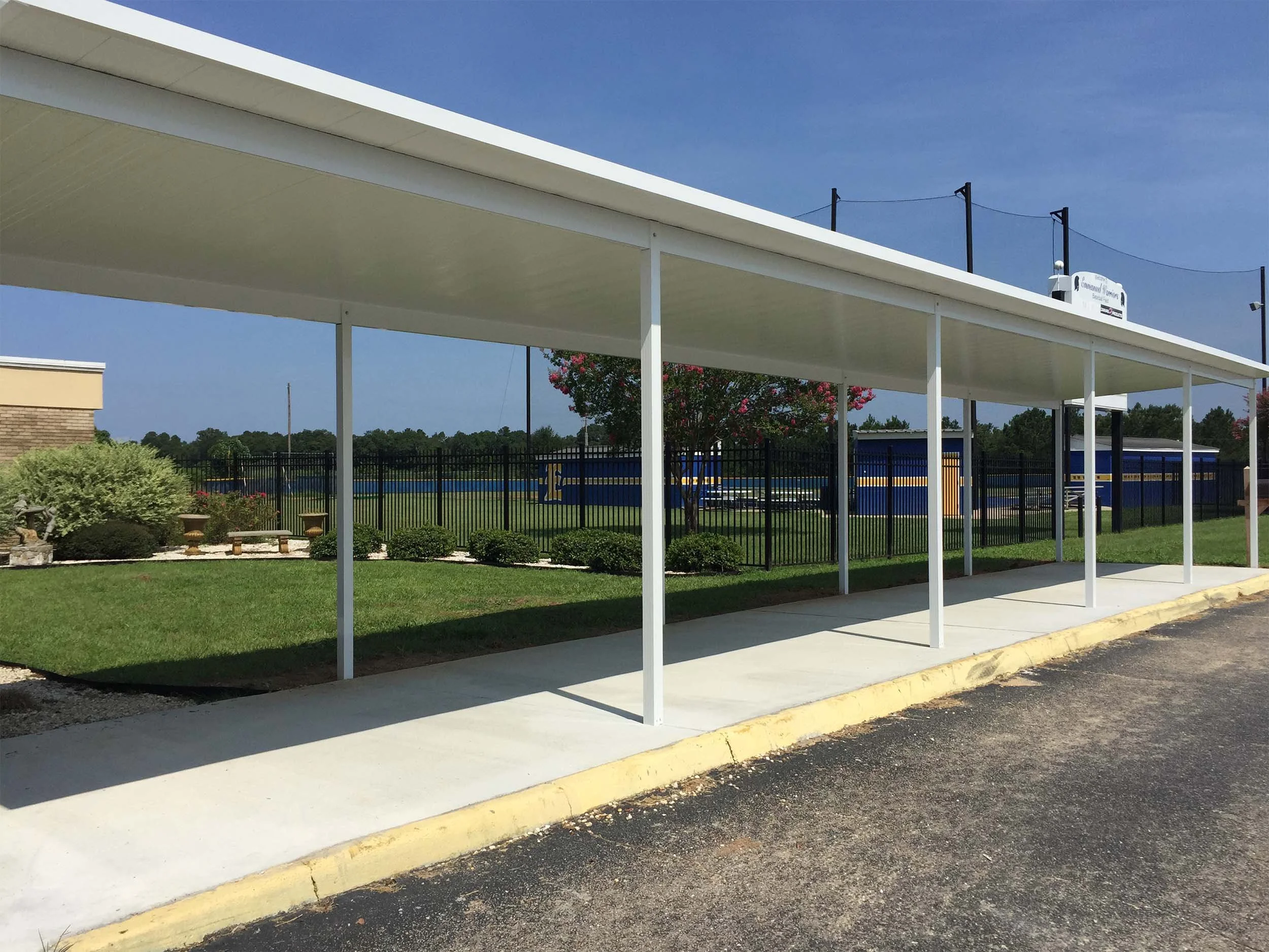 Custom covered walkway installed for a Dothan-area commercial property.