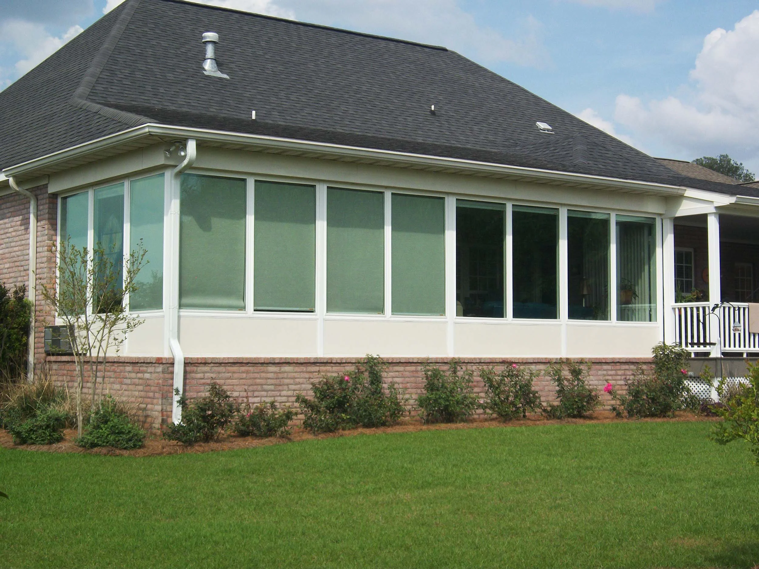 Residential sunroom addition built to expand usable living space.