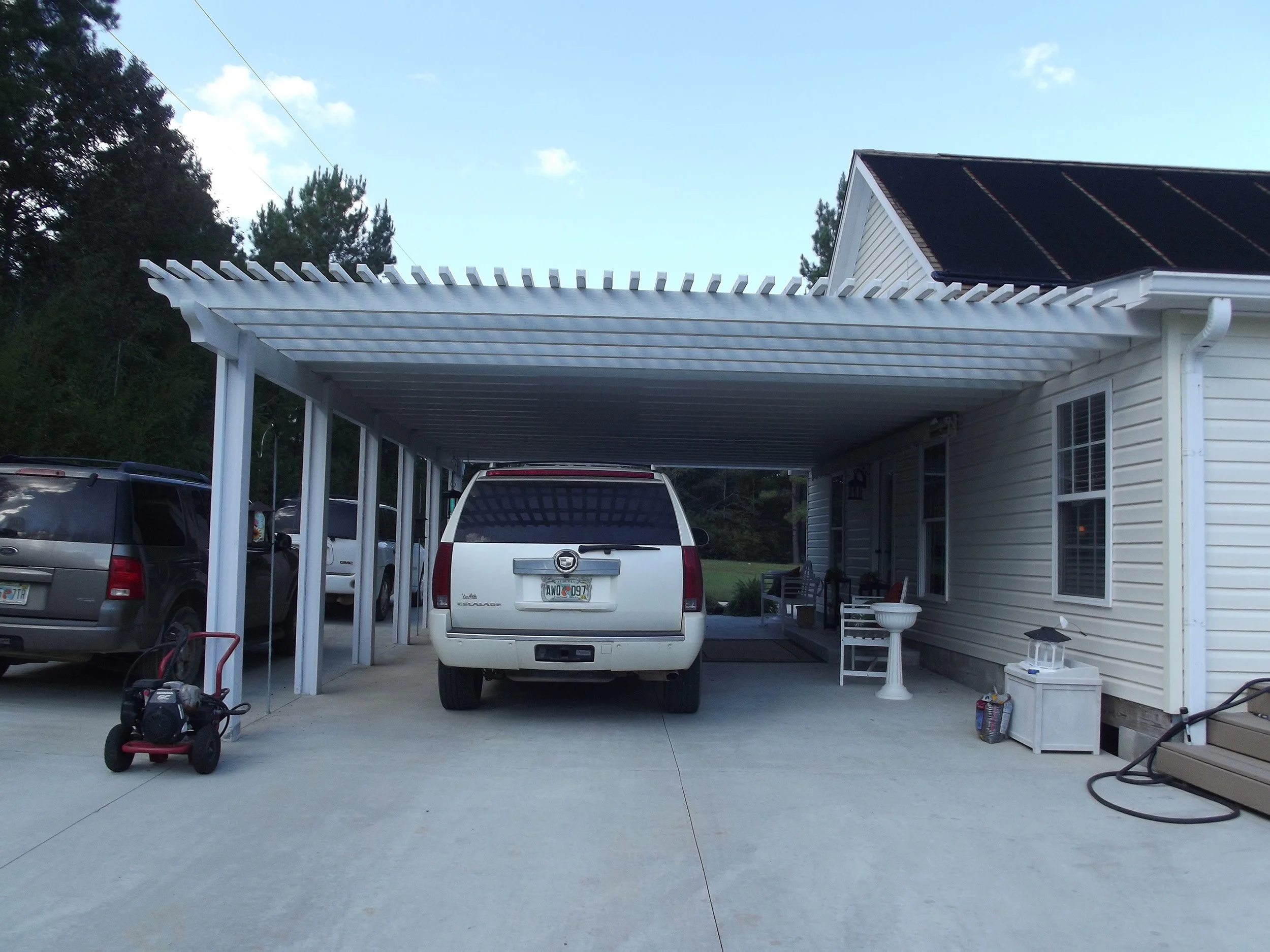Custom residential carport by Hathcock Home Services for added home convenience and beauty.