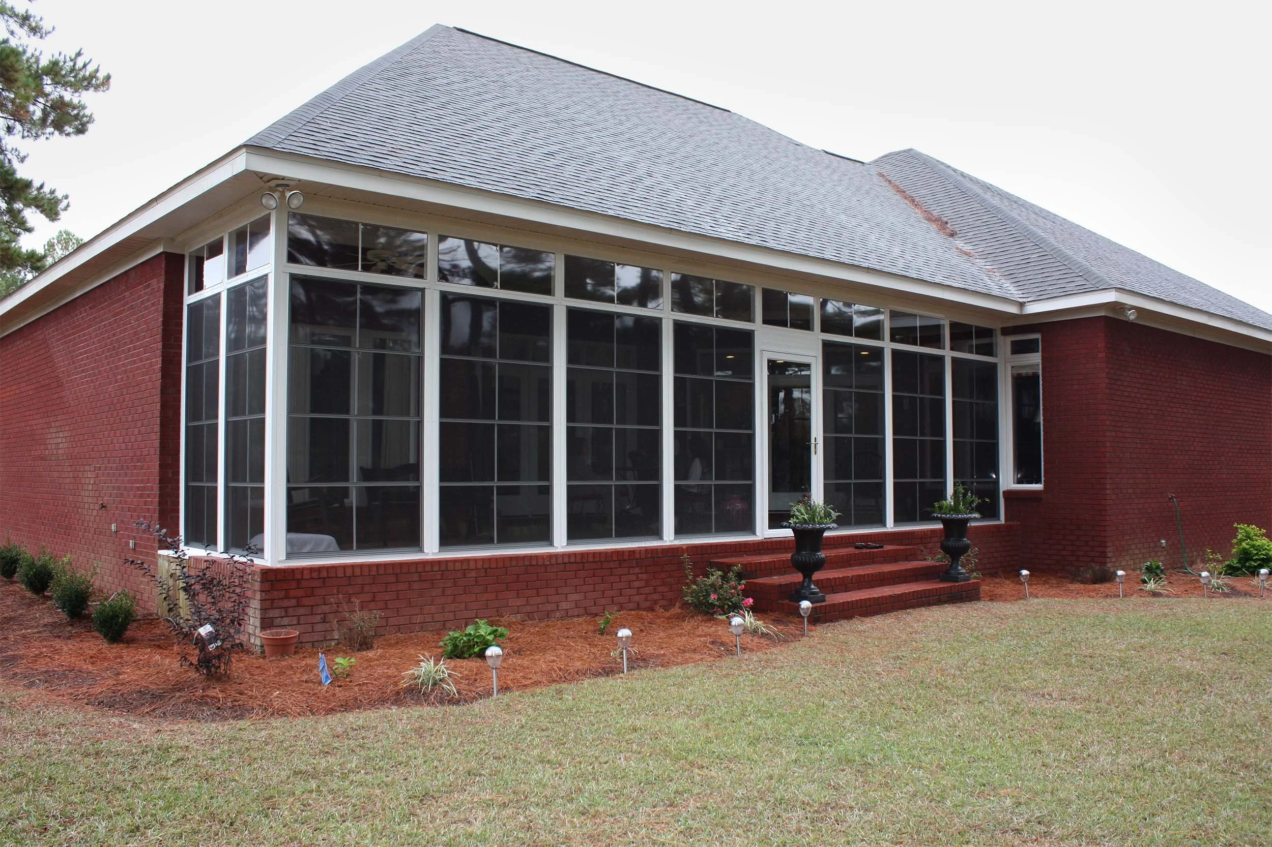 Custom EZE-Breeze room designed for flexible indoor-outdoor living.