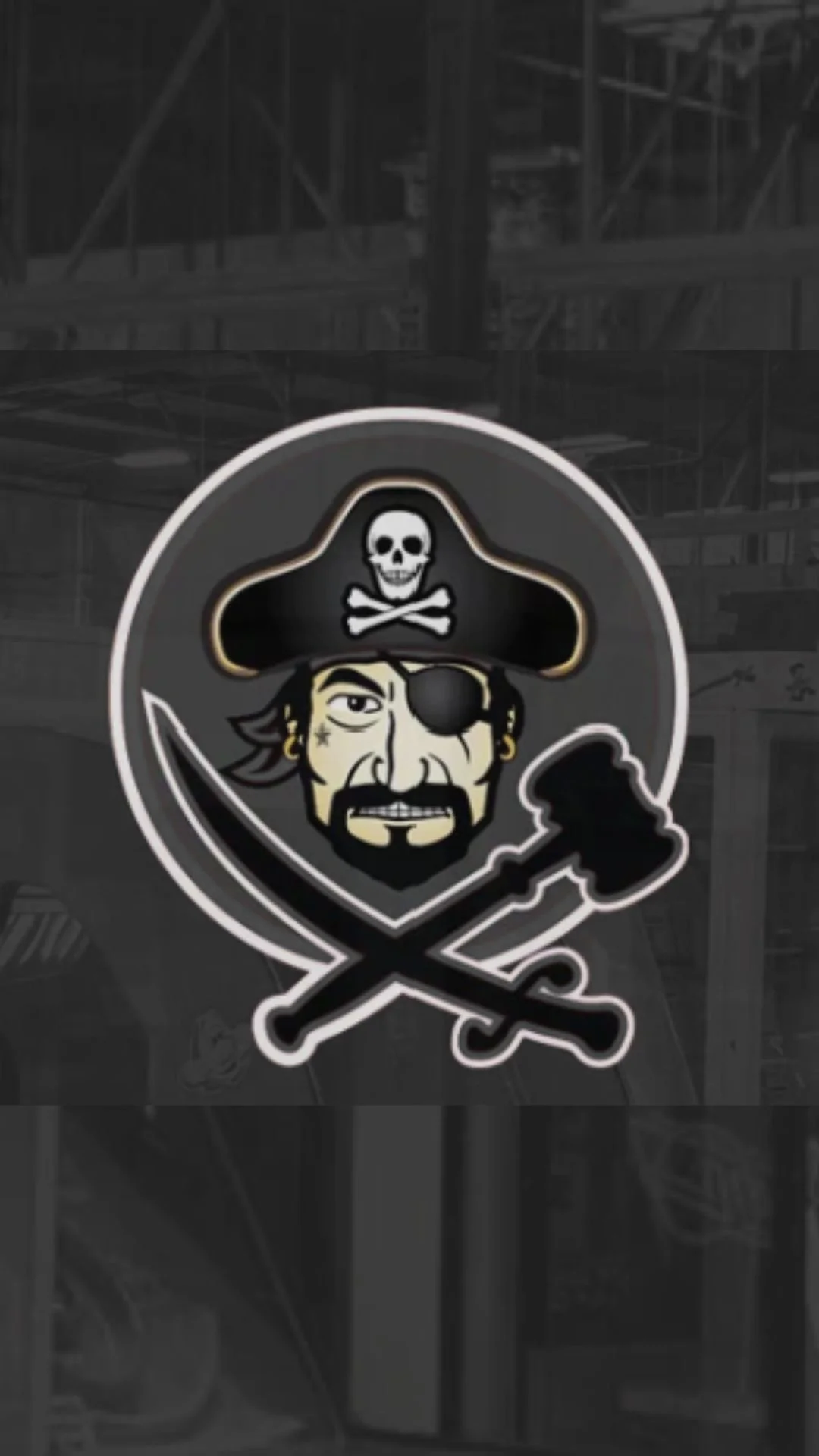 A pirate cartoon face with an eye patch, a beard, and earrings, wearing a pirate hat with a skull and crossbones, holding a sword, with two crossed sticks below. The background is dark.