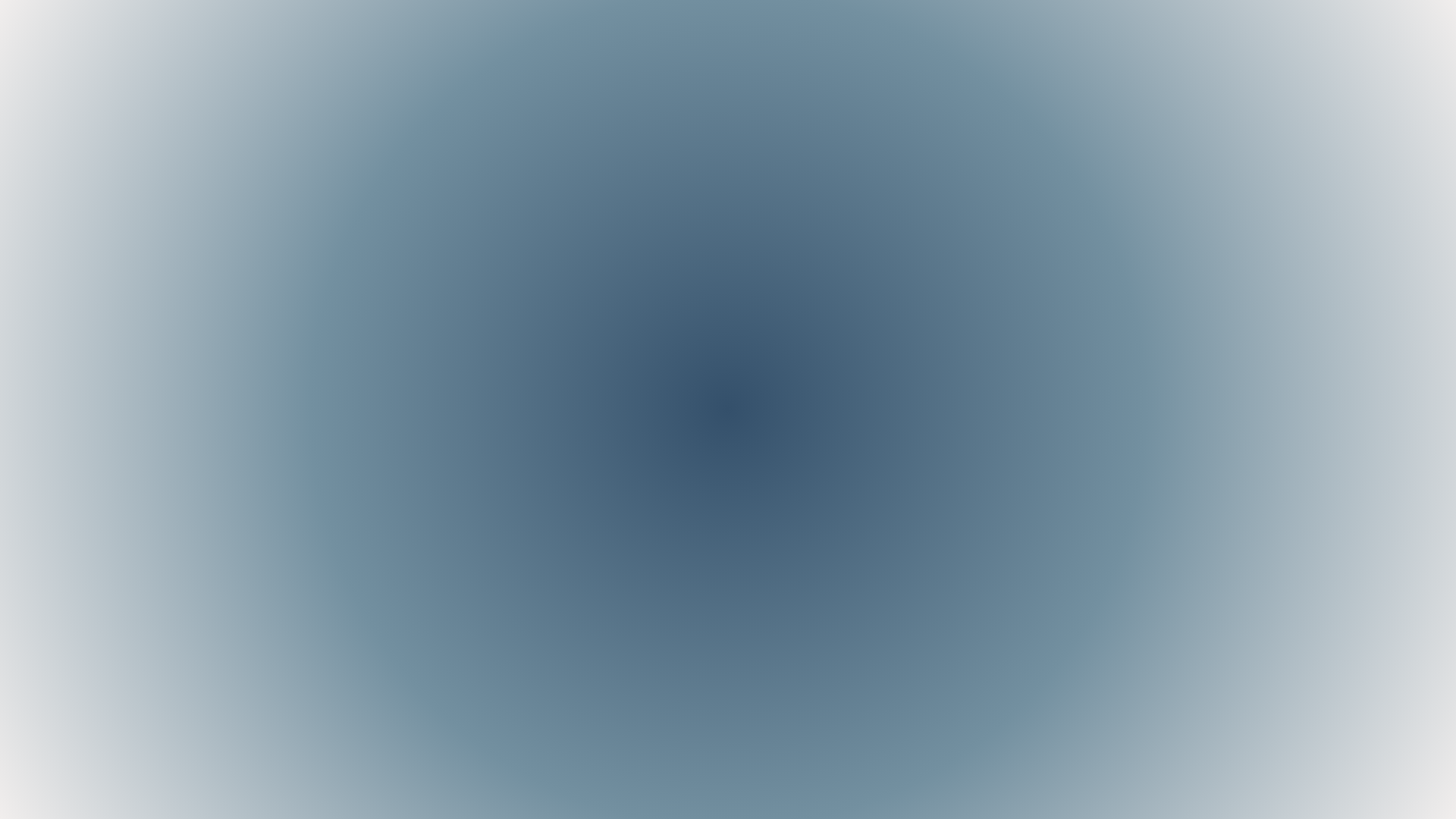 Blurred blue circular object with a gradient background.