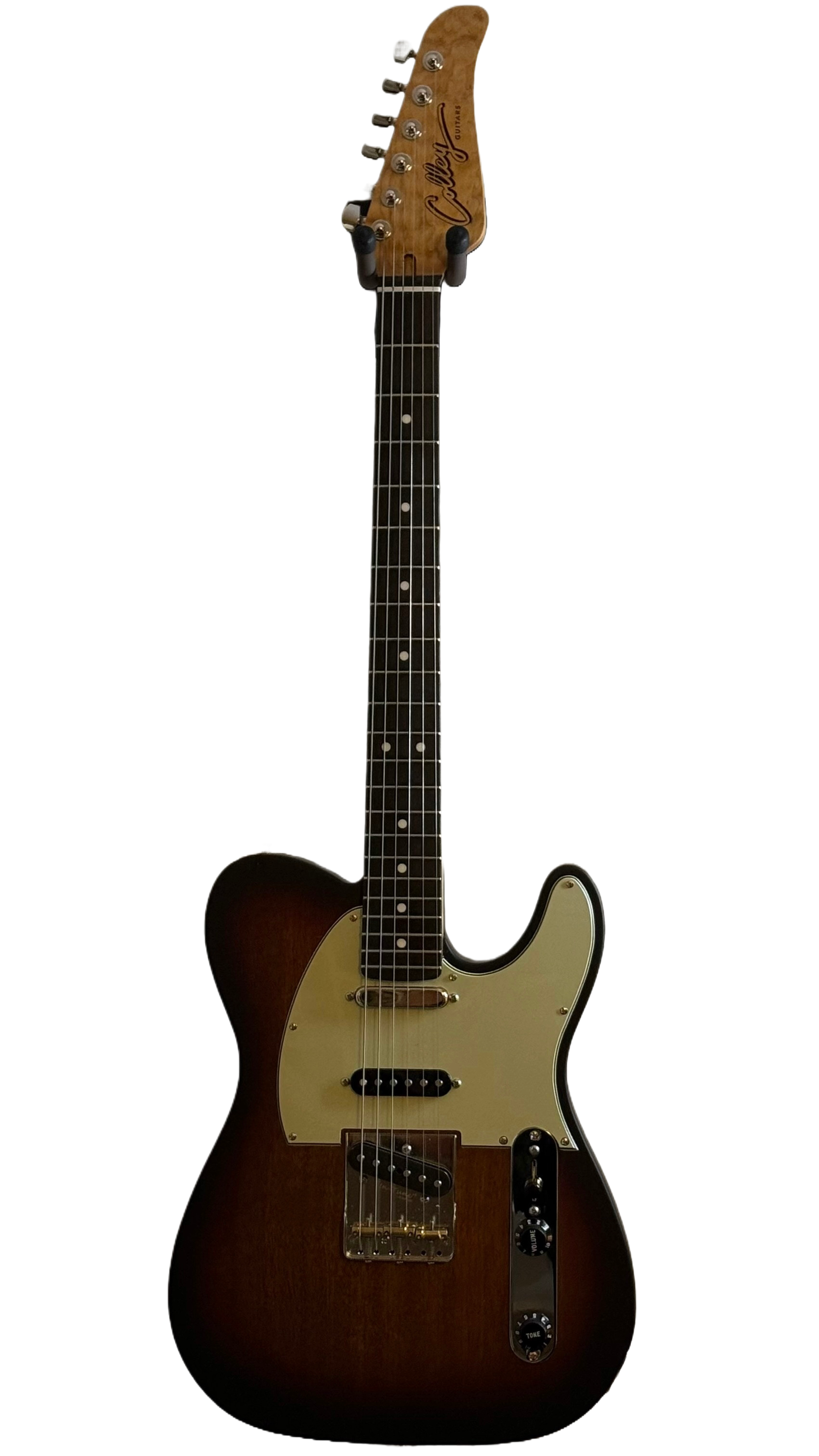 A vintage electric guitar with a wooden body, white pickguard, and multiple control knobs, against a black background.