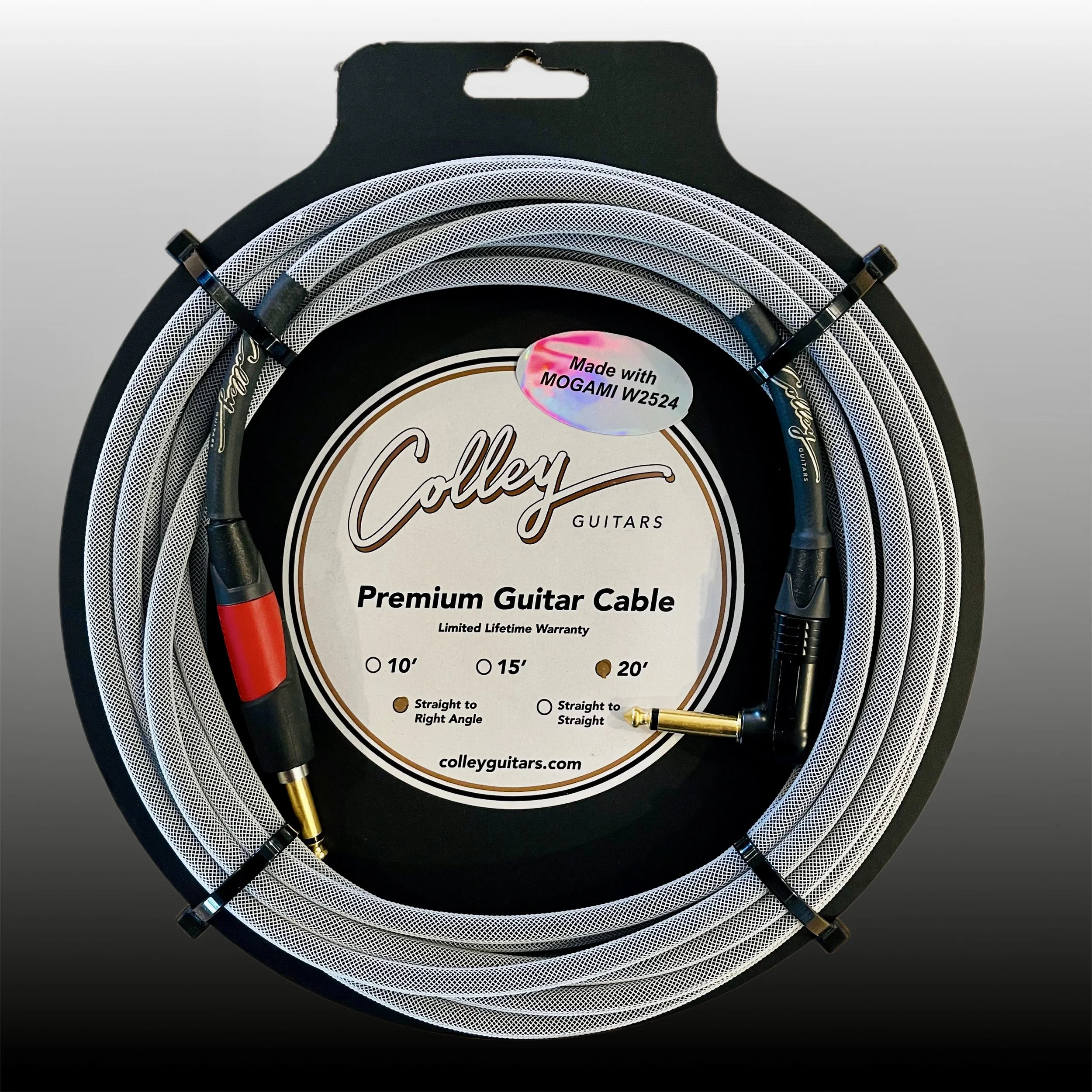 Coiled silver and black guitar cable with gold-plated connectors, secured with black clips, on a round packaging label that reads 'Colley Guitars Premium Guitar Cable.' The label indicates a limited lifetime warranty and options for 10, 15, and 20 feet lengths, with a red and black connector on the left and a black connector on the right.