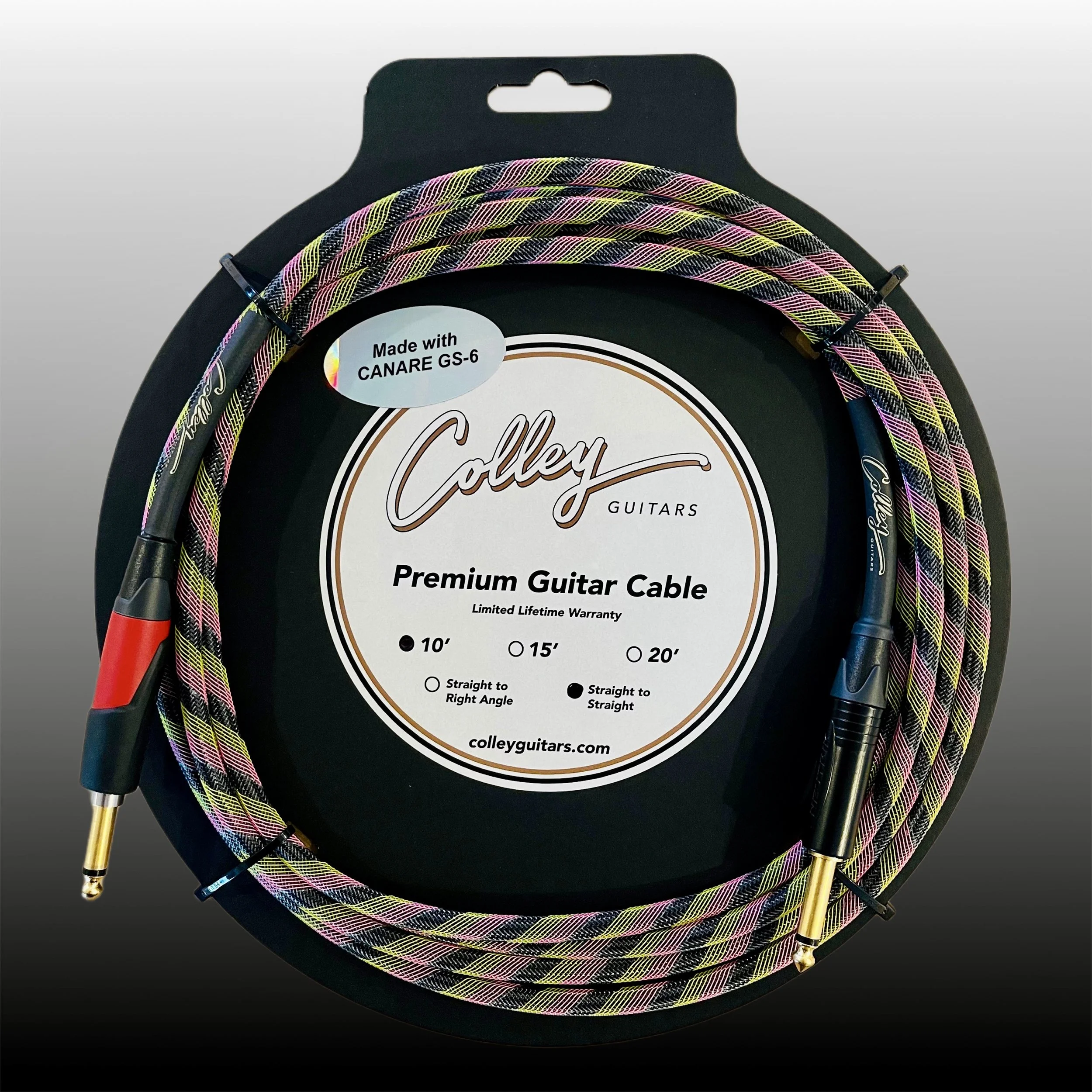 A colorful guitar cable coiled on a black circular display with a label reading "Colley Guitars Premium Guitar Cable" and information about length options of 10, 15, and 20 feet, made with Canare GS-6.