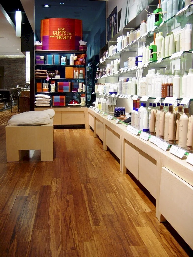 A storefront with Bamboo hardwood floors in a rich earthy tone, installed by Fourth Gen Flooring In Hiawatha Iowa.