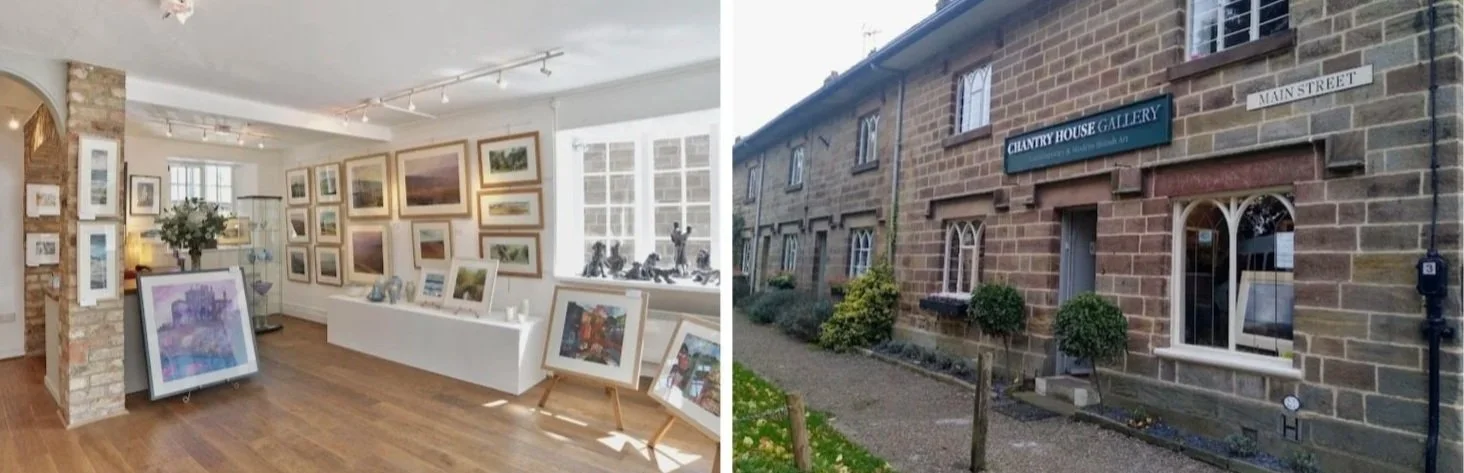 An art gallery interior displaying framed paintings on white walls and a table with sculptures, with wooden flooring and large windows. Outside, a gallery building with a sign 'Chantry House Gallery' on a brick exterior, adjacent to a street with small trees and shrubs.