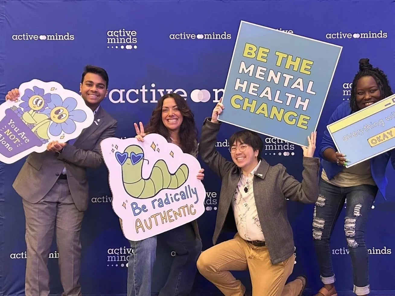 Center Road Staff and Clients smiling as they advocate for mental health