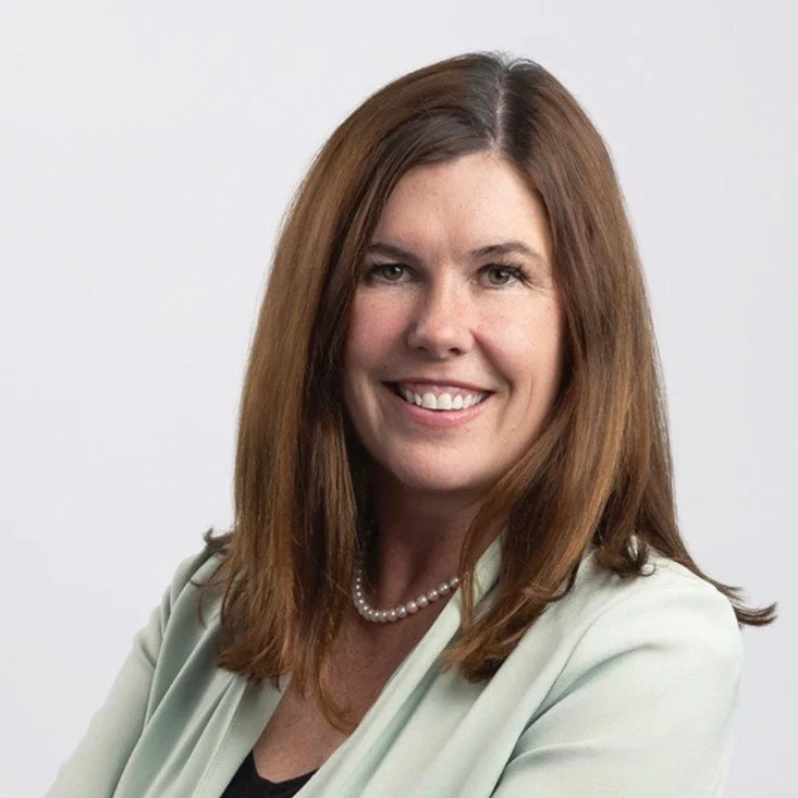 A woman with shoulder-length brown hair smiling, wearing a light-colored blazer and a pearl necklace, against a plain white background. Lisa Cooke

Senior VP, Chief Marketing Officer, ATCO