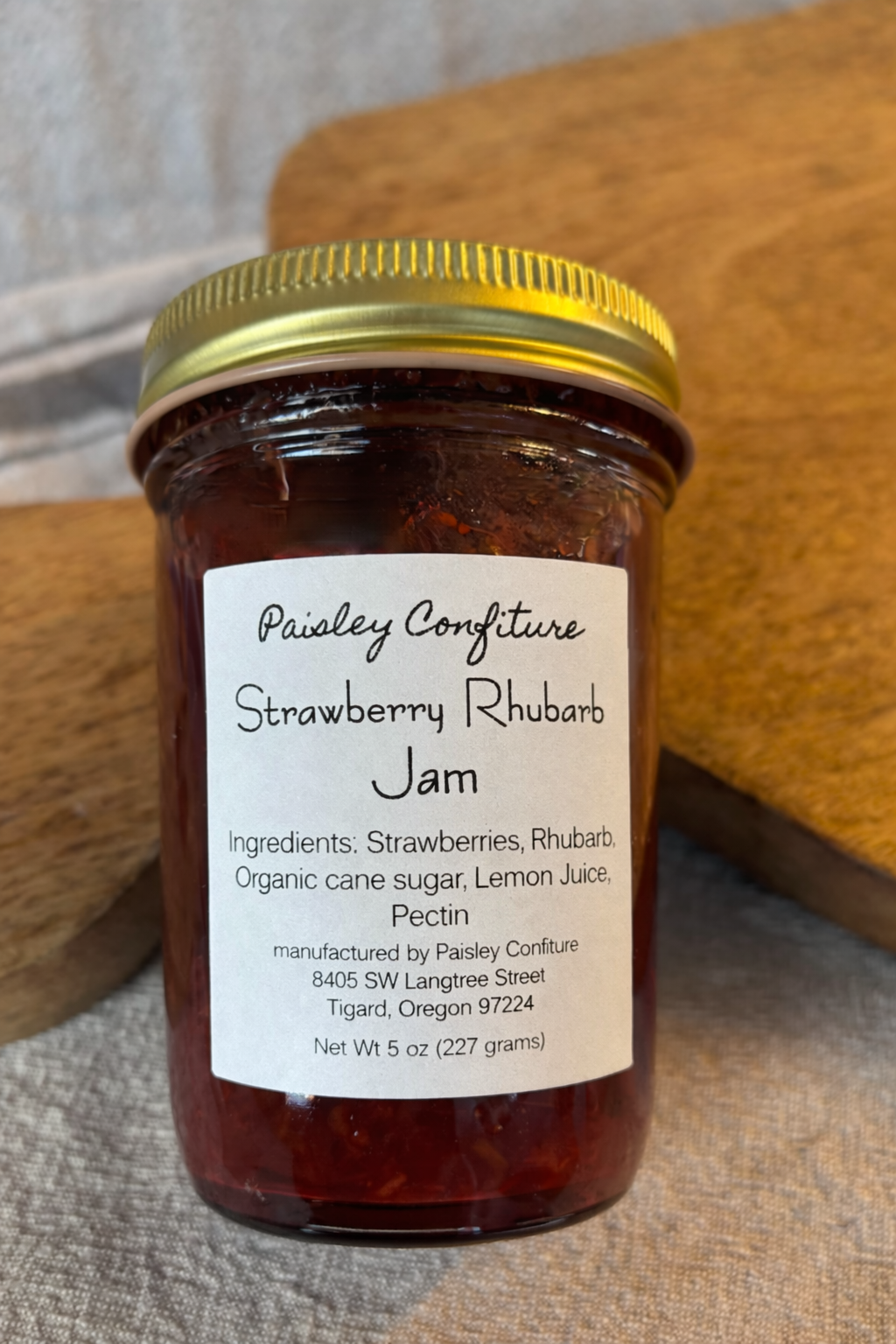 Strawberry rhubarb jam jar close-up.png