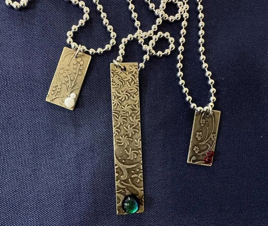 Karen-Karg-Etched-Pendants.jpg
