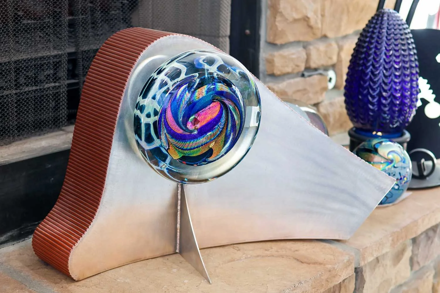 Metal and blown glass sculpture at Karg Art Glass