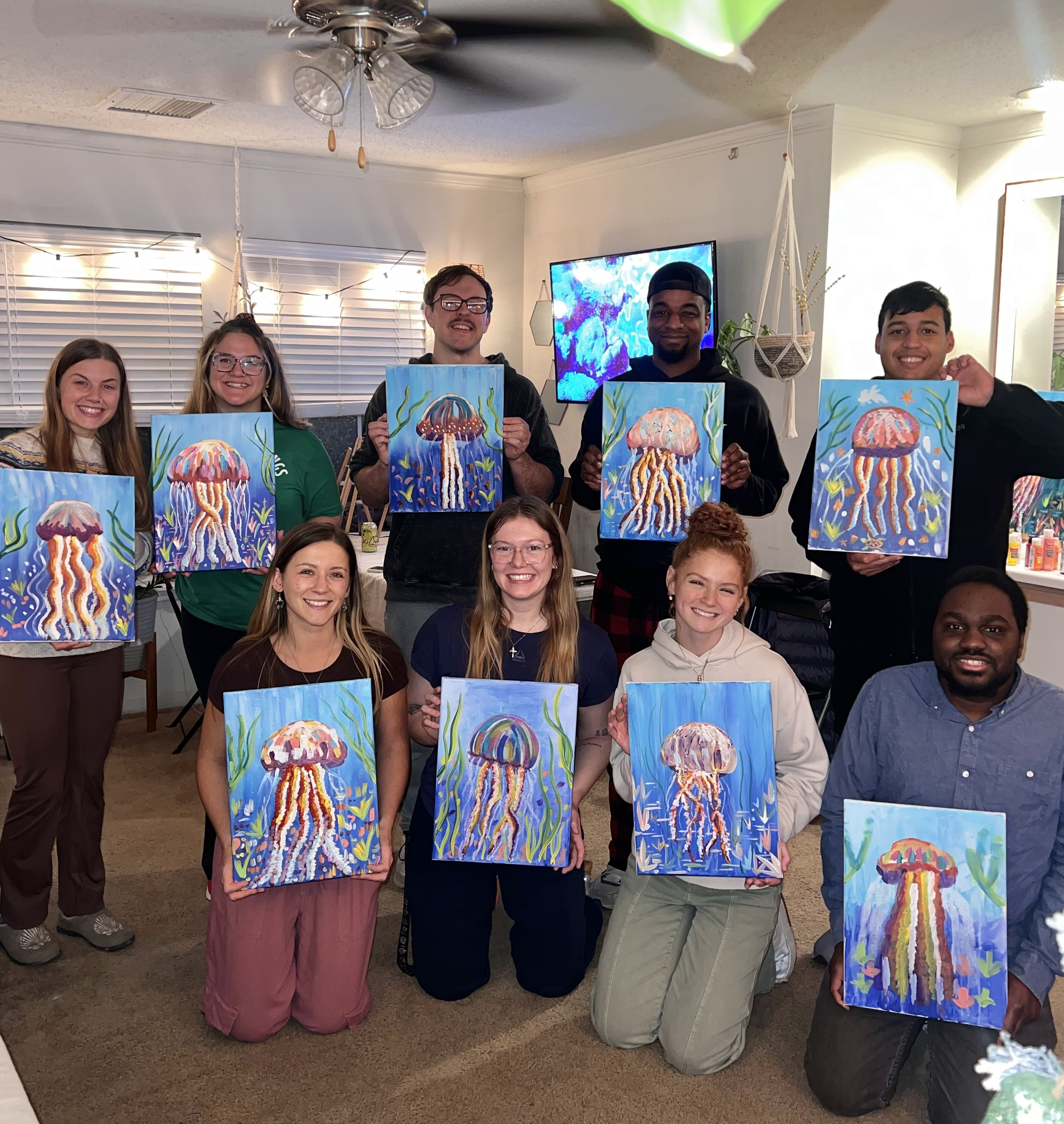 Revive and Create Package. A fun group of 8 gathered in the clients apartment. A living room turned into an art studio!