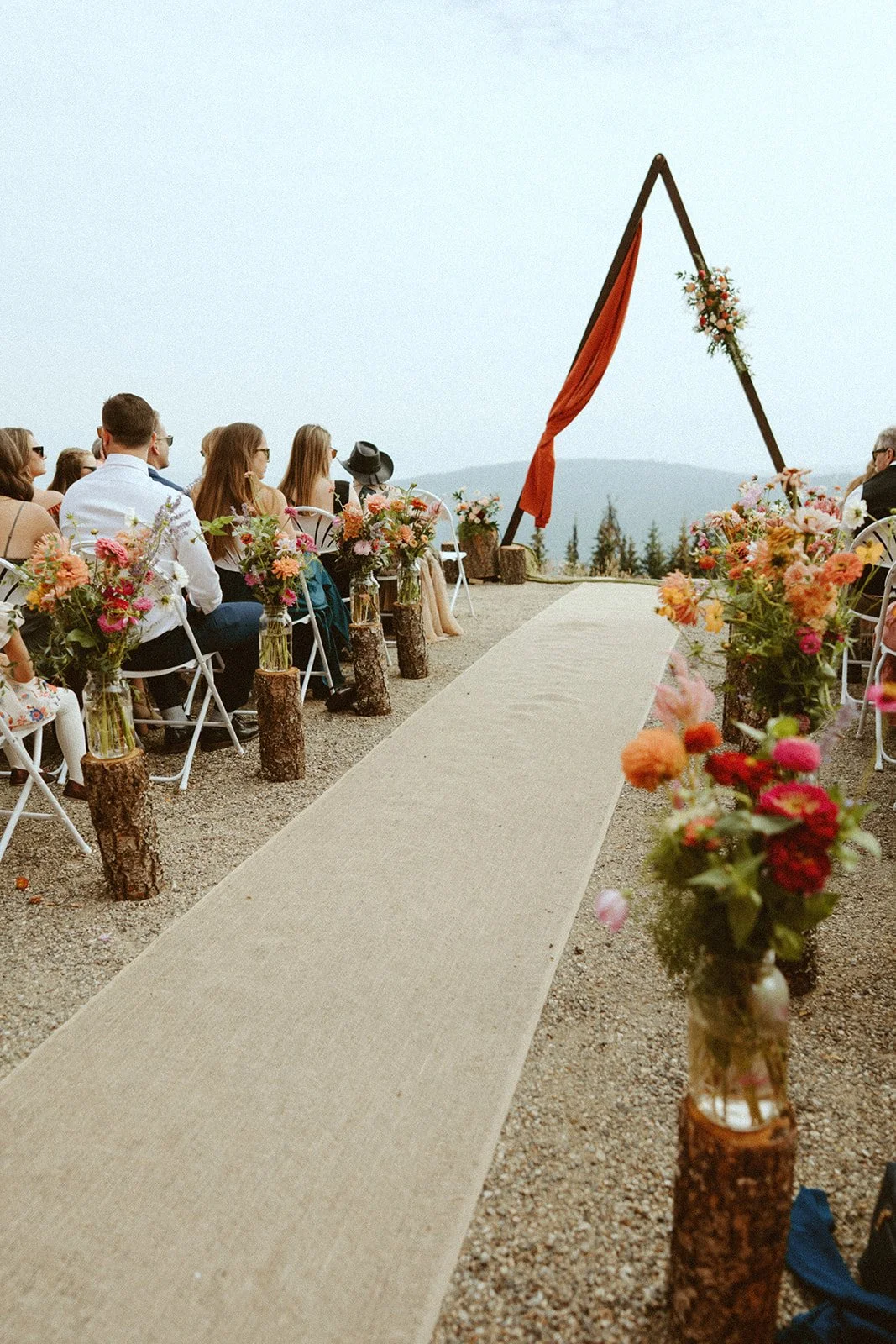 Velluto Events Co. Wedding arch, mountain top wedding