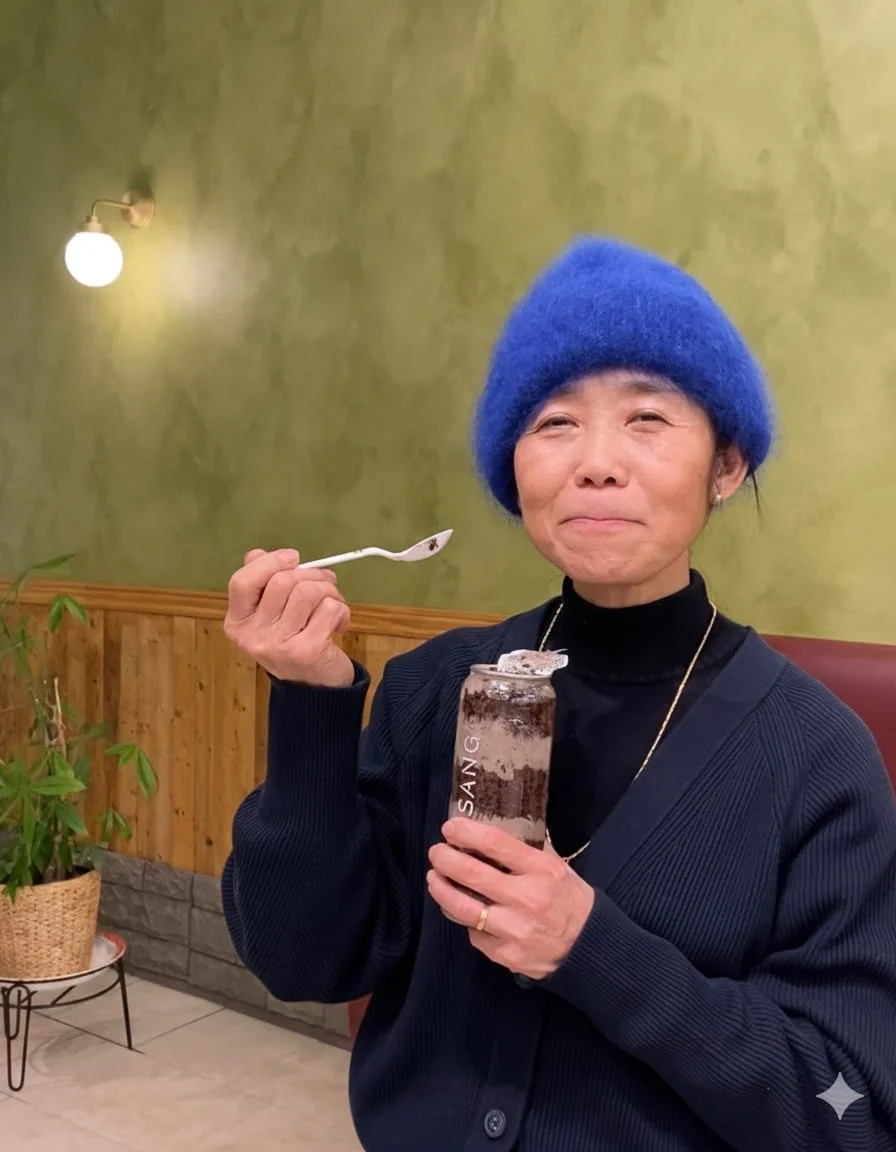 Founder of Nhasang enjoying a freshly sealed canned cake in Saint-Laurent. Experience our signature Vietnamese egg coffee and artisanal desserts at our Montréal café