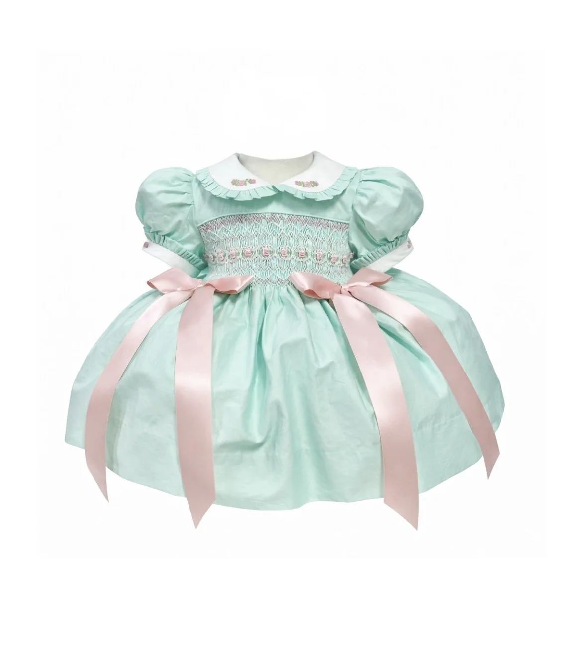 A light blue baby dress with puffed sleeves, smocked bodice, pink ribbons at the waist, and embroidered floral details.