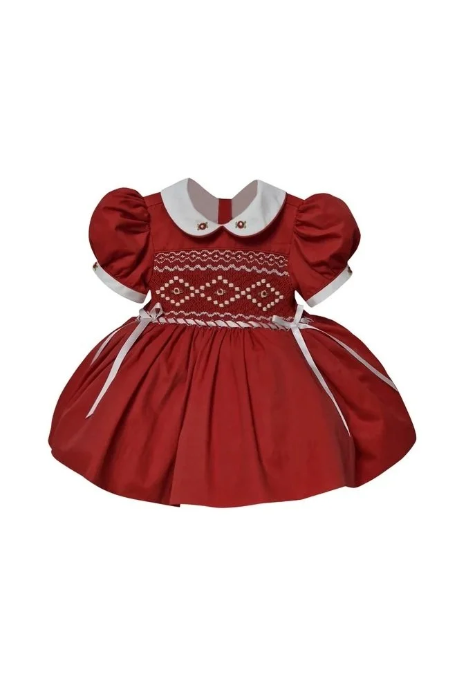 Red children's dress with puffed sleeves, white collar, and embroidered bodice, displayed against a white background.
