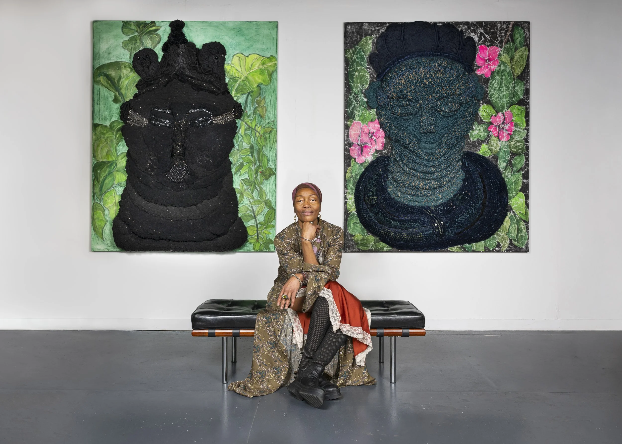 Artist Zainab Sumu with woven sculptural works from the Supernal Beauty series.