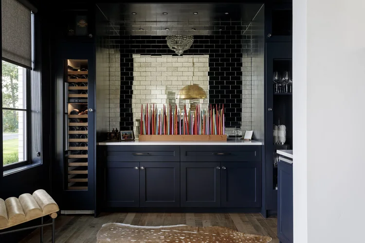 Modern white farmhouse with black steel windows